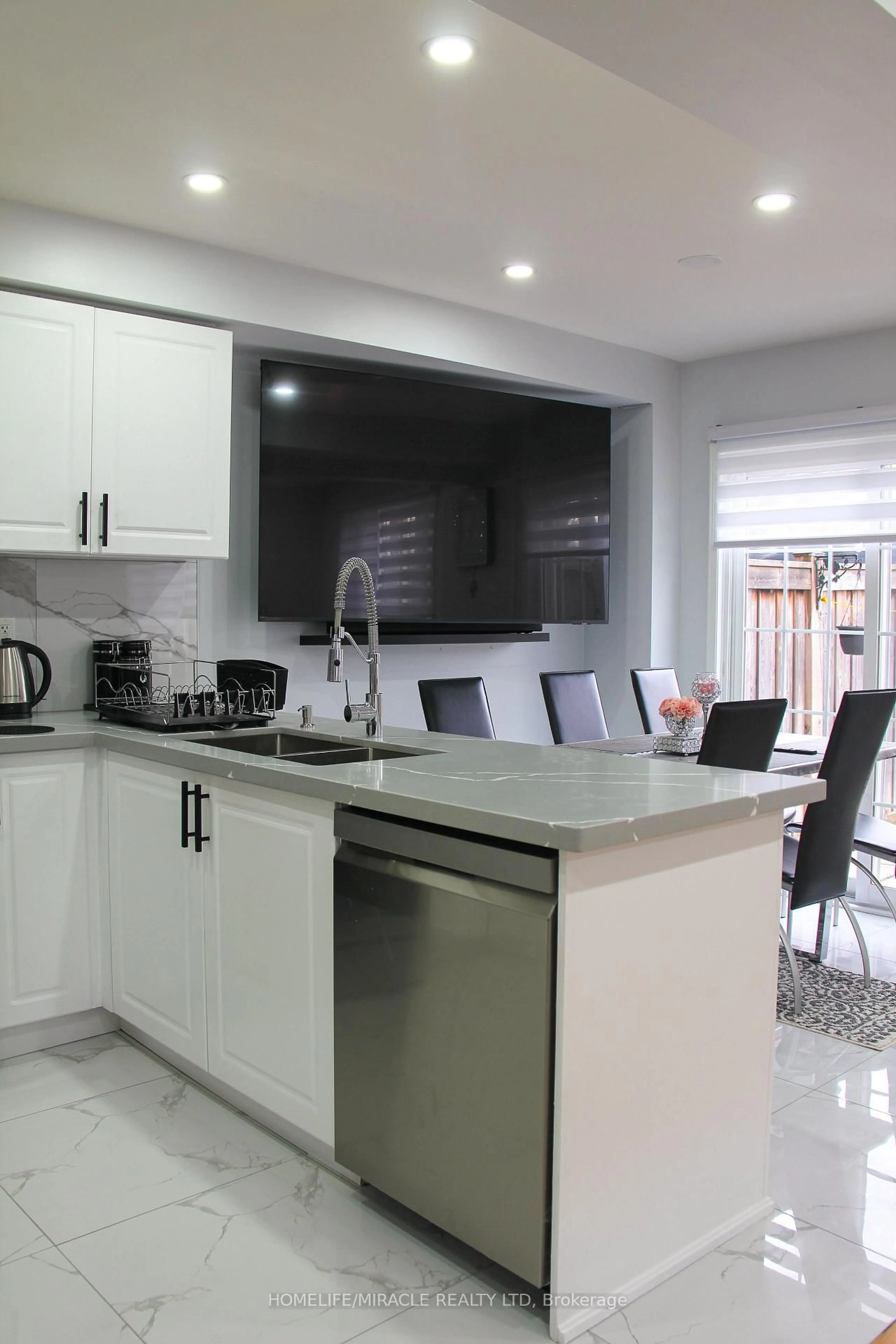 Open concept kitchen, ceramic/tile floor for 60 Bushmill Circ, Brampton Ontario L7A 0K8