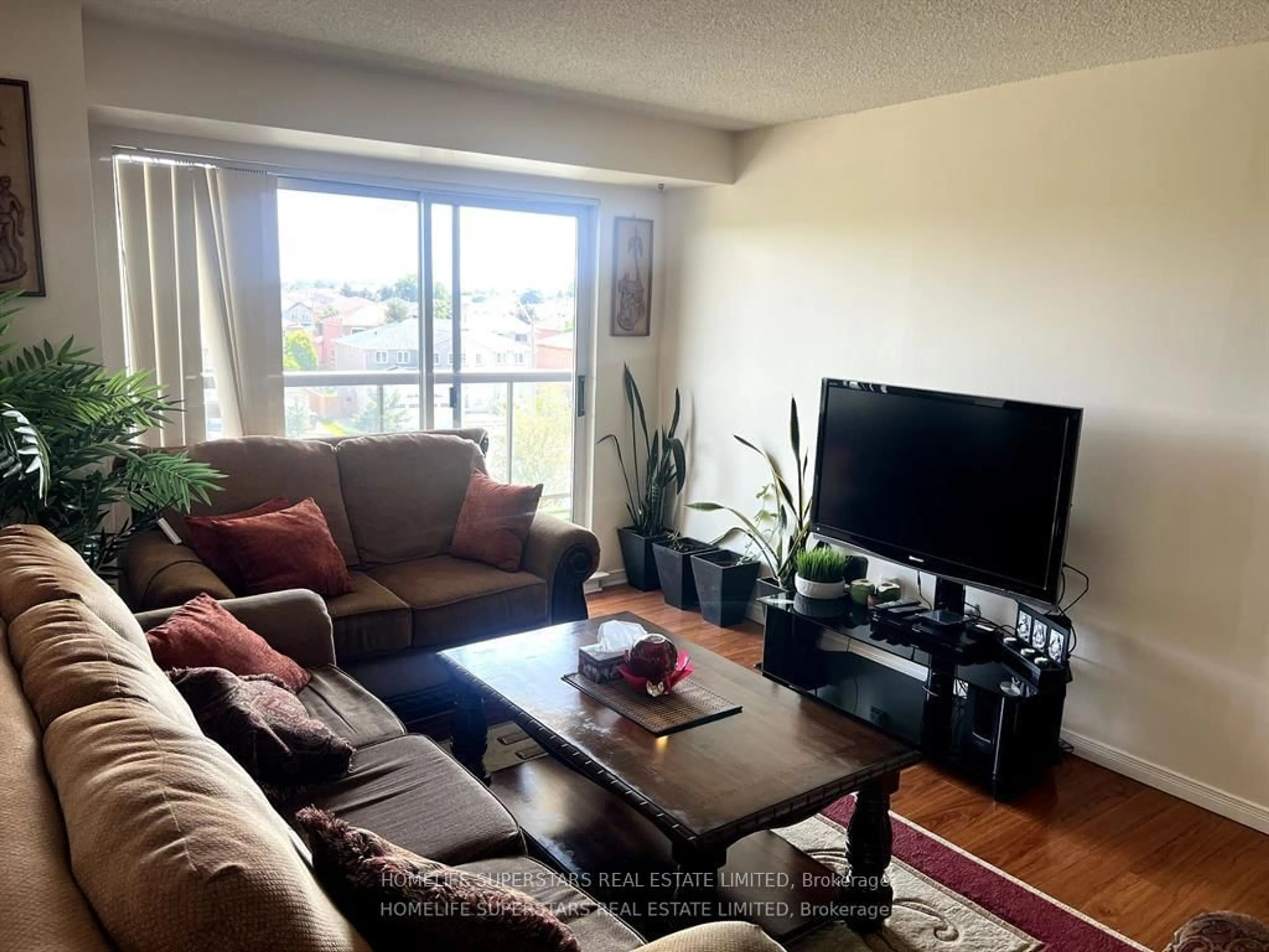 Living room with furniture, unknown for 300 Ray Lawson Blvd #416, Brampton Ontario L6Y 5H5