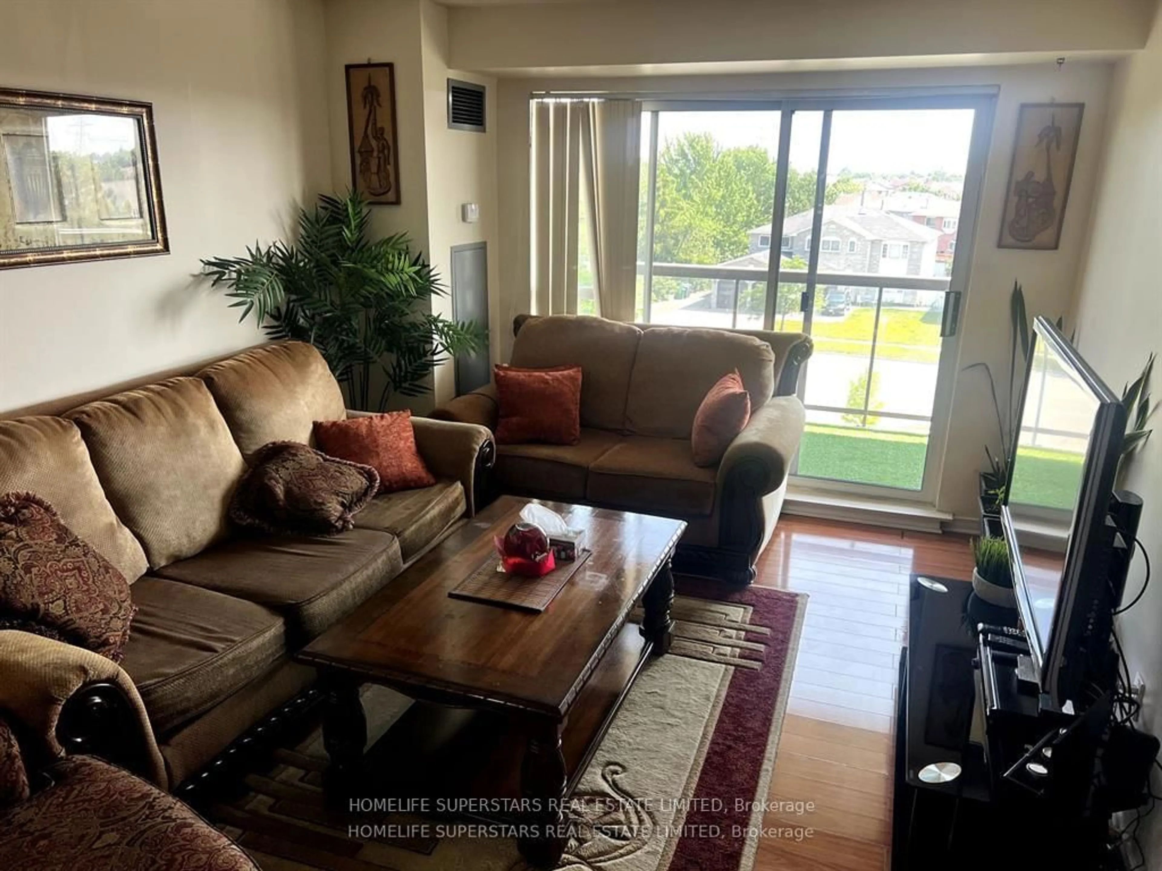 Living room with furniture, unknown for 300 Ray Lawson Blvd #416, Brampton Ontario L6Y 5H5