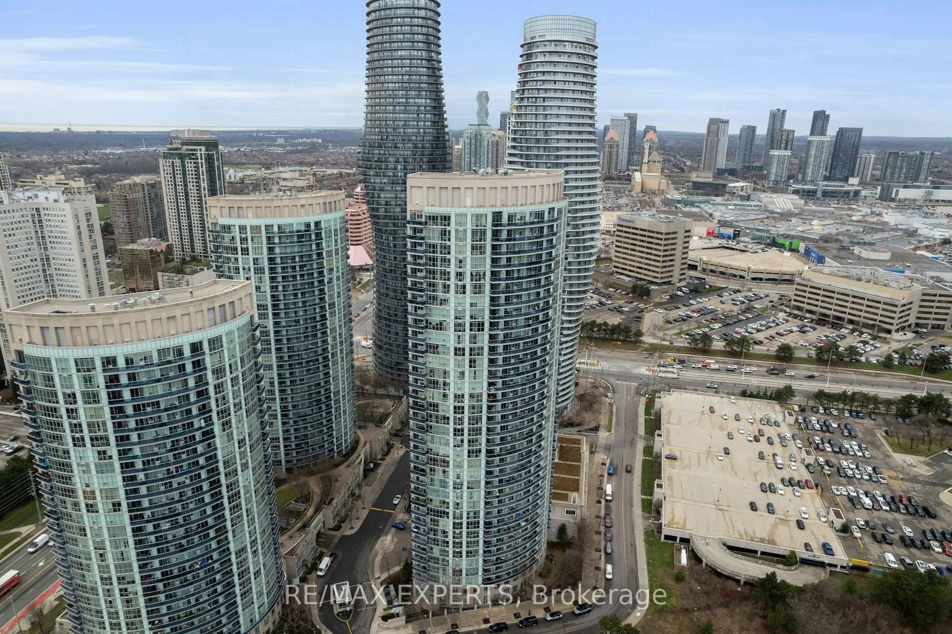 A pic from outside/outdoor area/front of a property/back of a property/a pic from drone, city buildings view from balcony for 80 Absolute Ave #2111, Mississauga Ontario L4Z 0A4