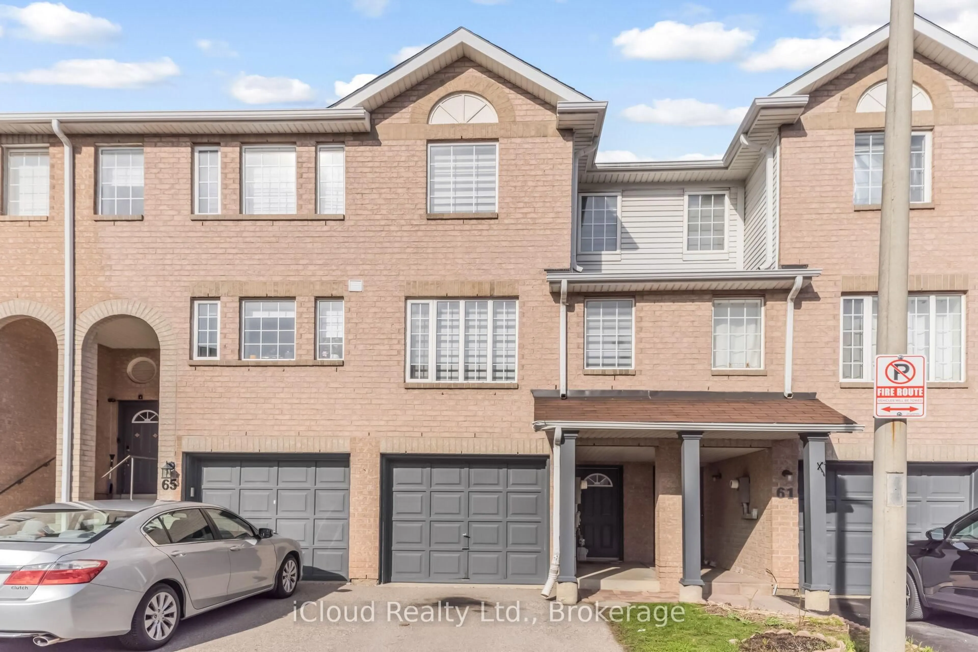 Home with brick exterior material, street for 63 Spadina Rd, Brampton Ontario L6X 4X6