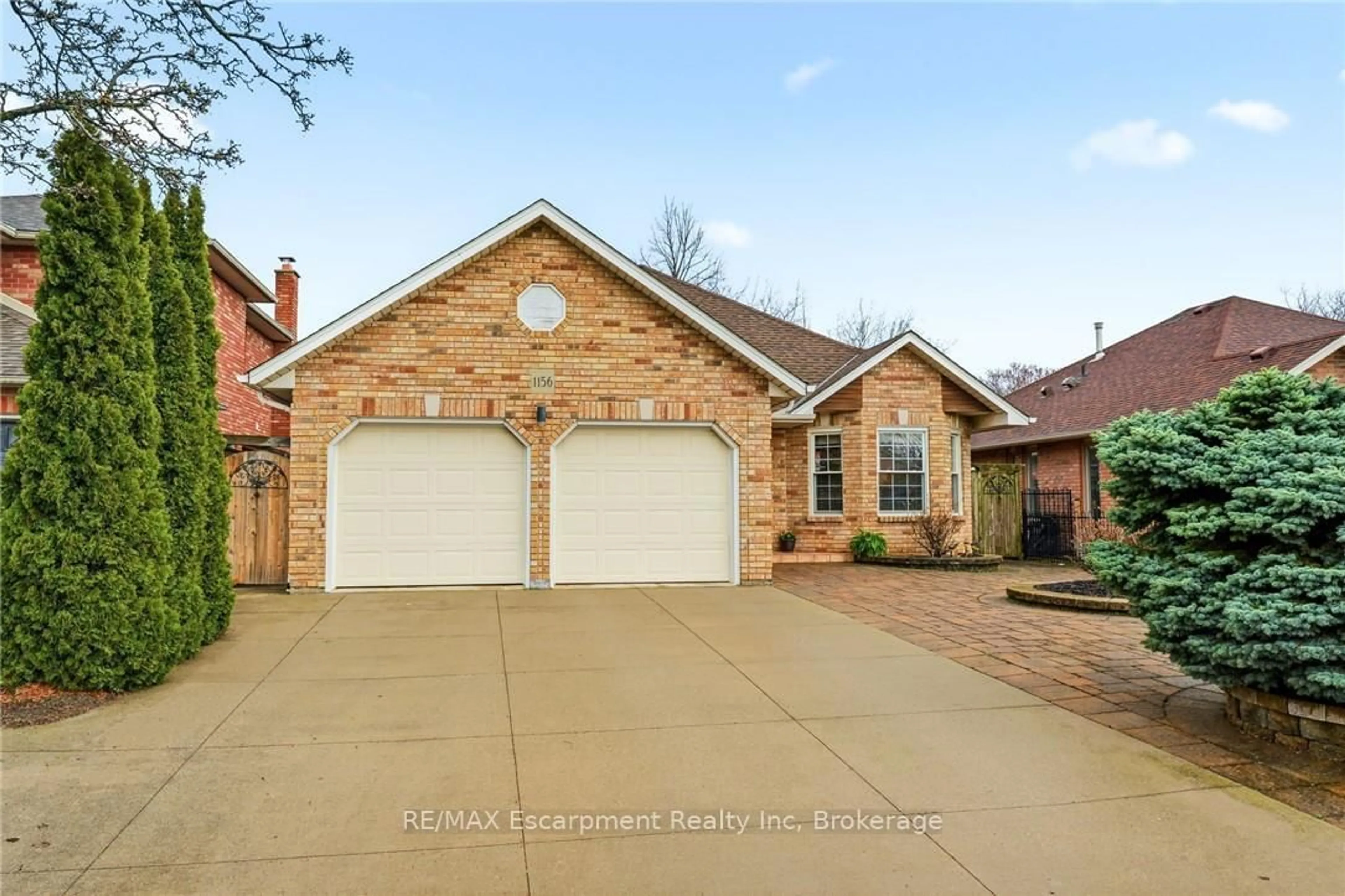 Home with brick exterior material, street for 1156 AUGUSTUS Dr, Burlington Ontario L7S 2K5