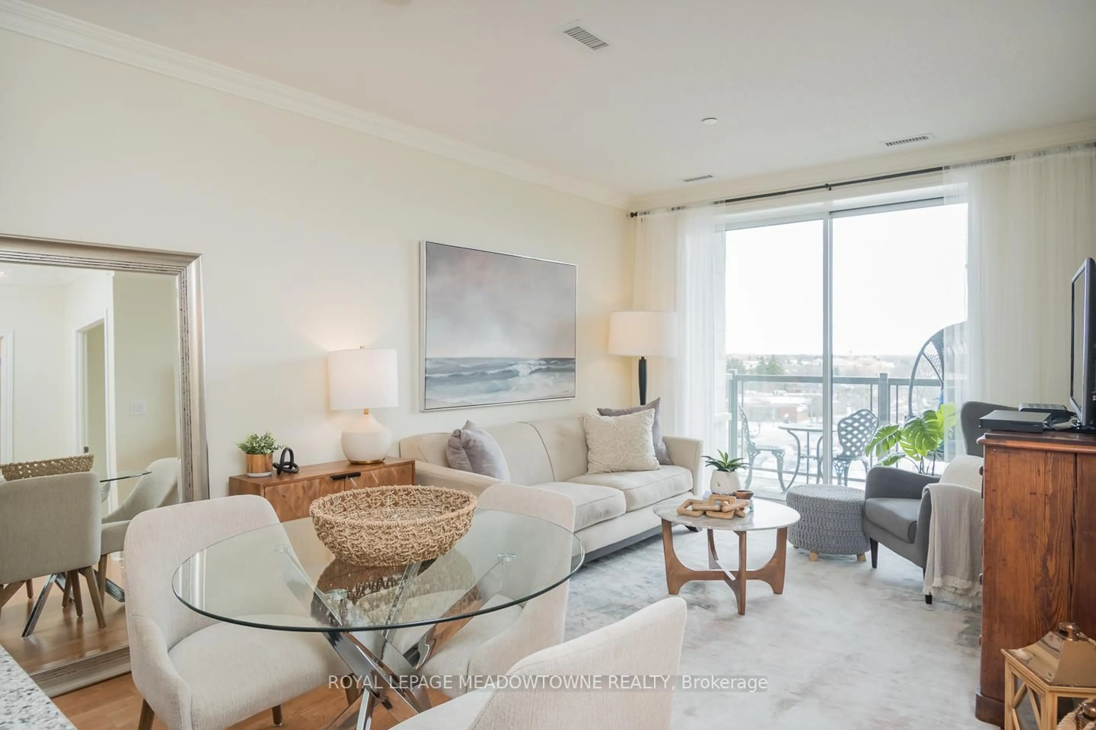 Living room with furniture, unknown for 383 Main St #609, Milton Ontario L9T 8K8