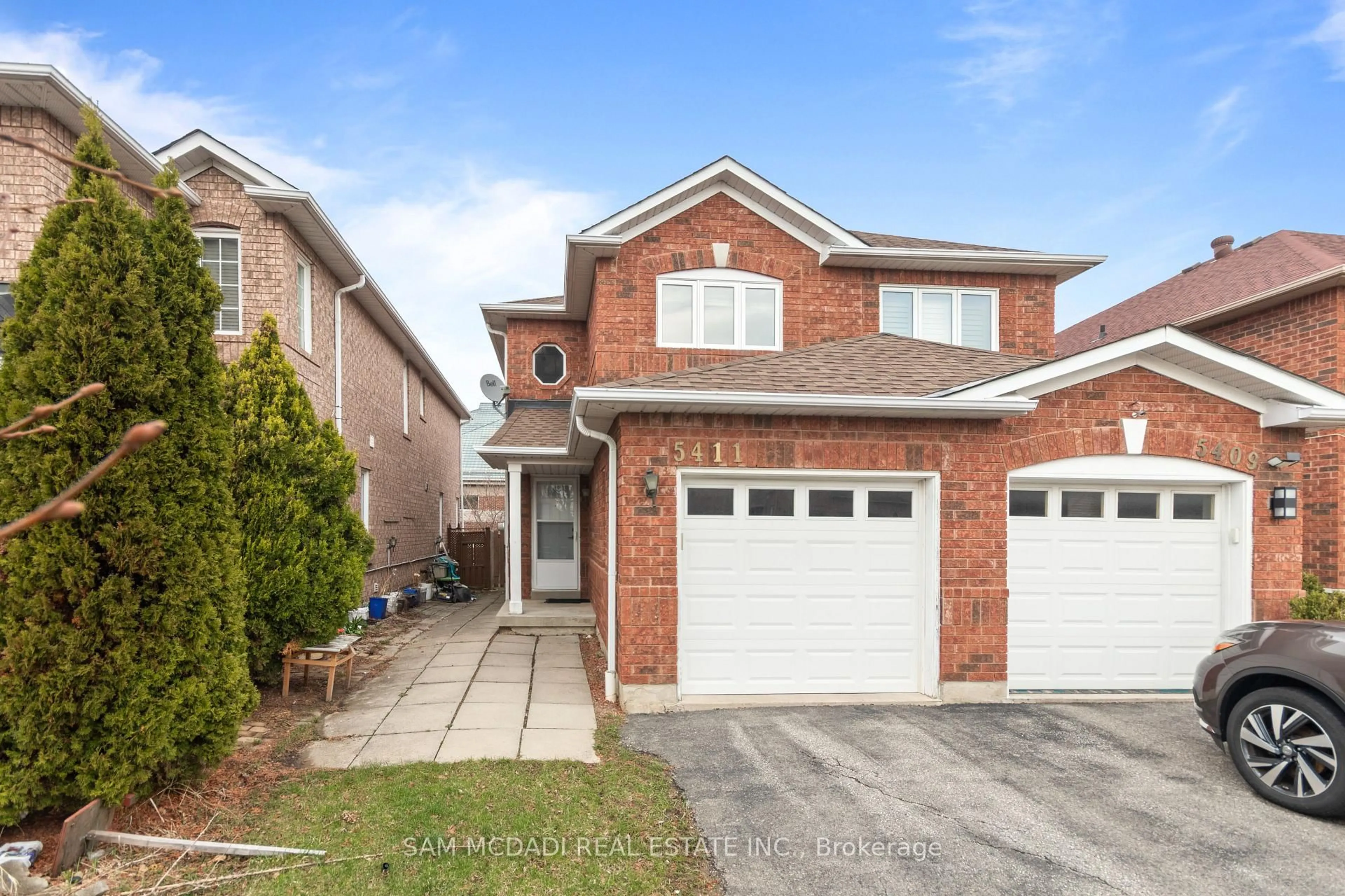 Home with brick exterior material, street for 5411 Sweetgrass Gate, Mississauga Ontario L5V 2N2