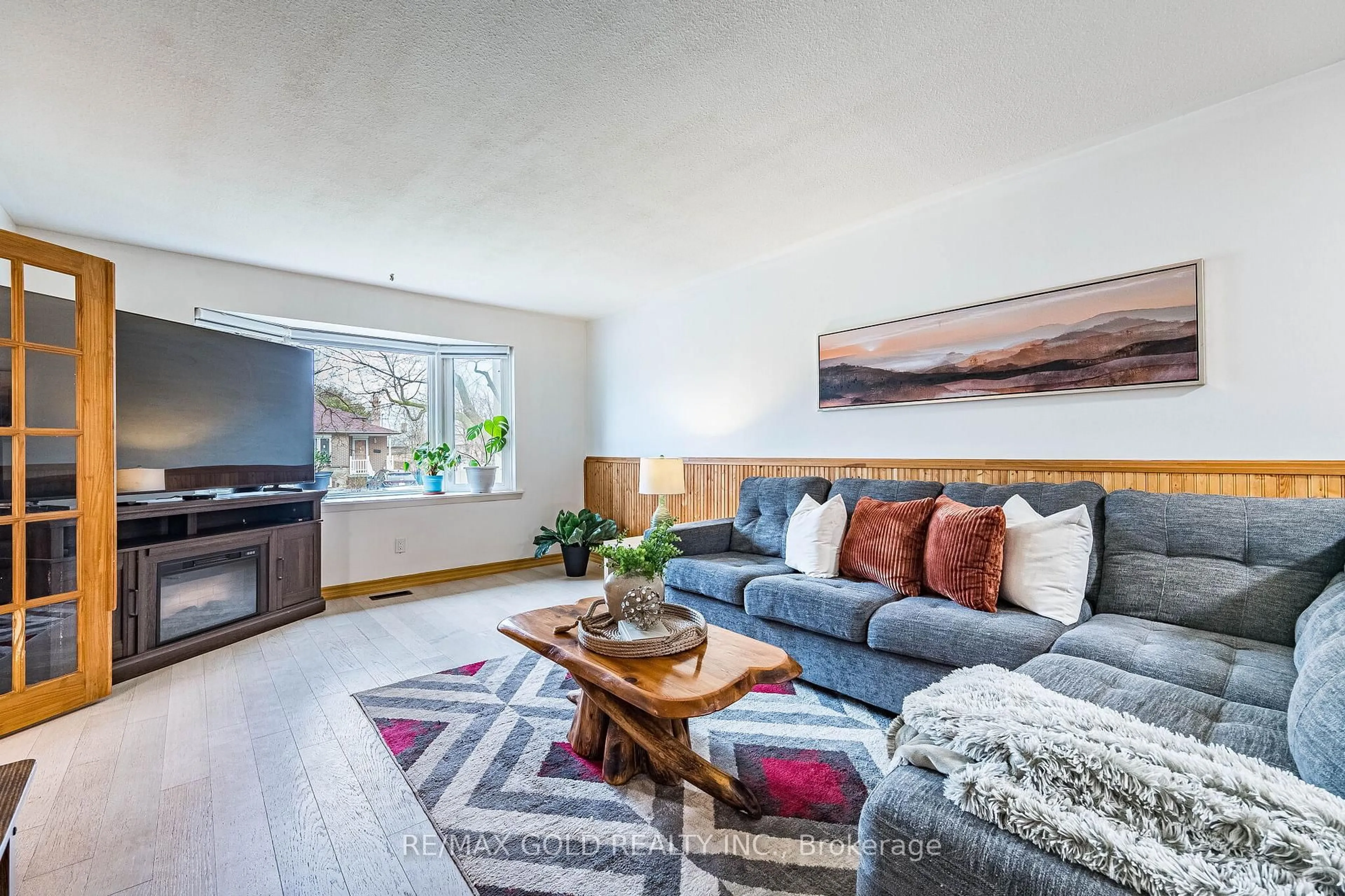 Living room with furniture, unknown for 52 Garfield Cres, Brampton Ontario L6V 1V8