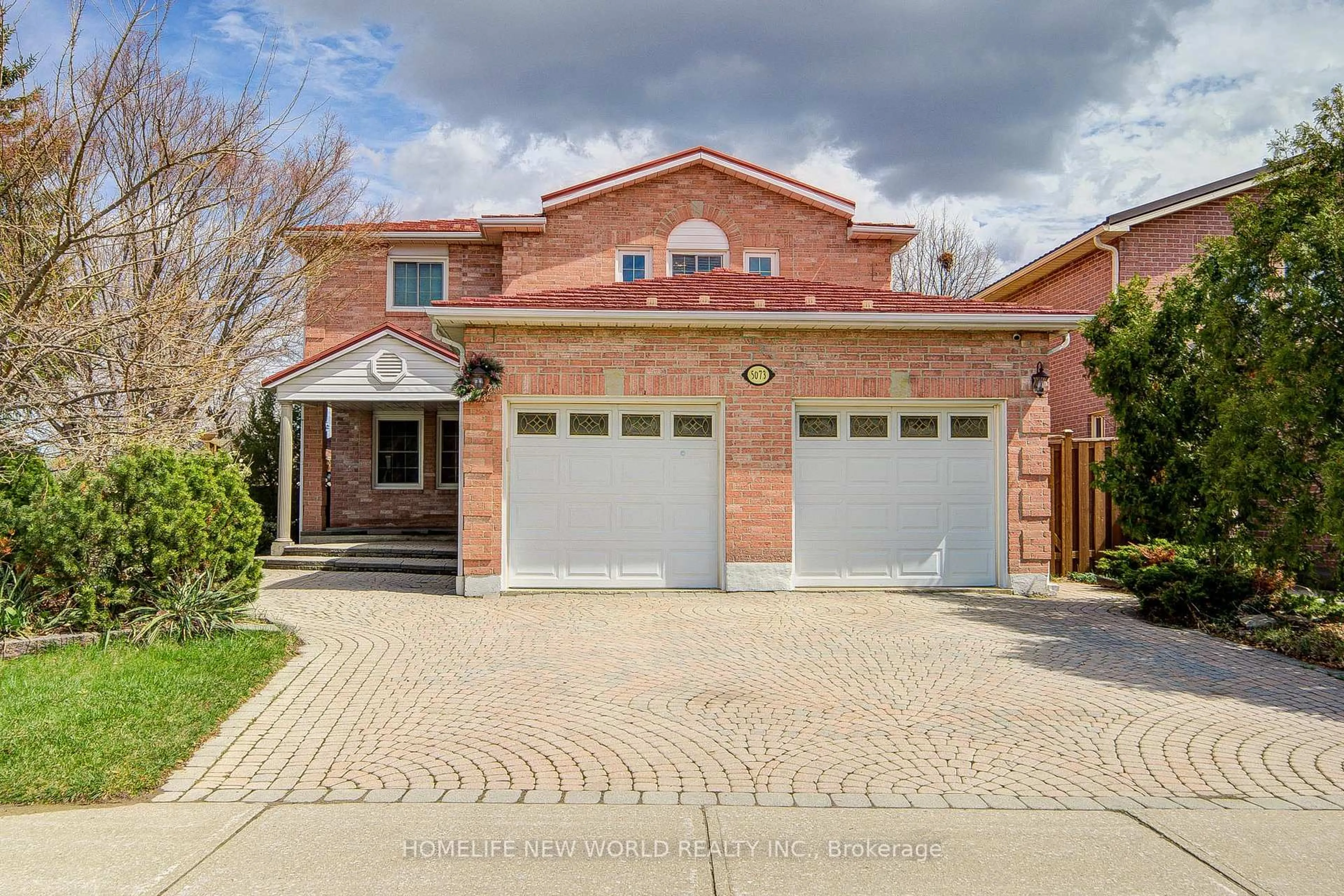 Home with brick exterior material, street for 5073 Guildwood Way, Mississauga Ontario L5R 2R7