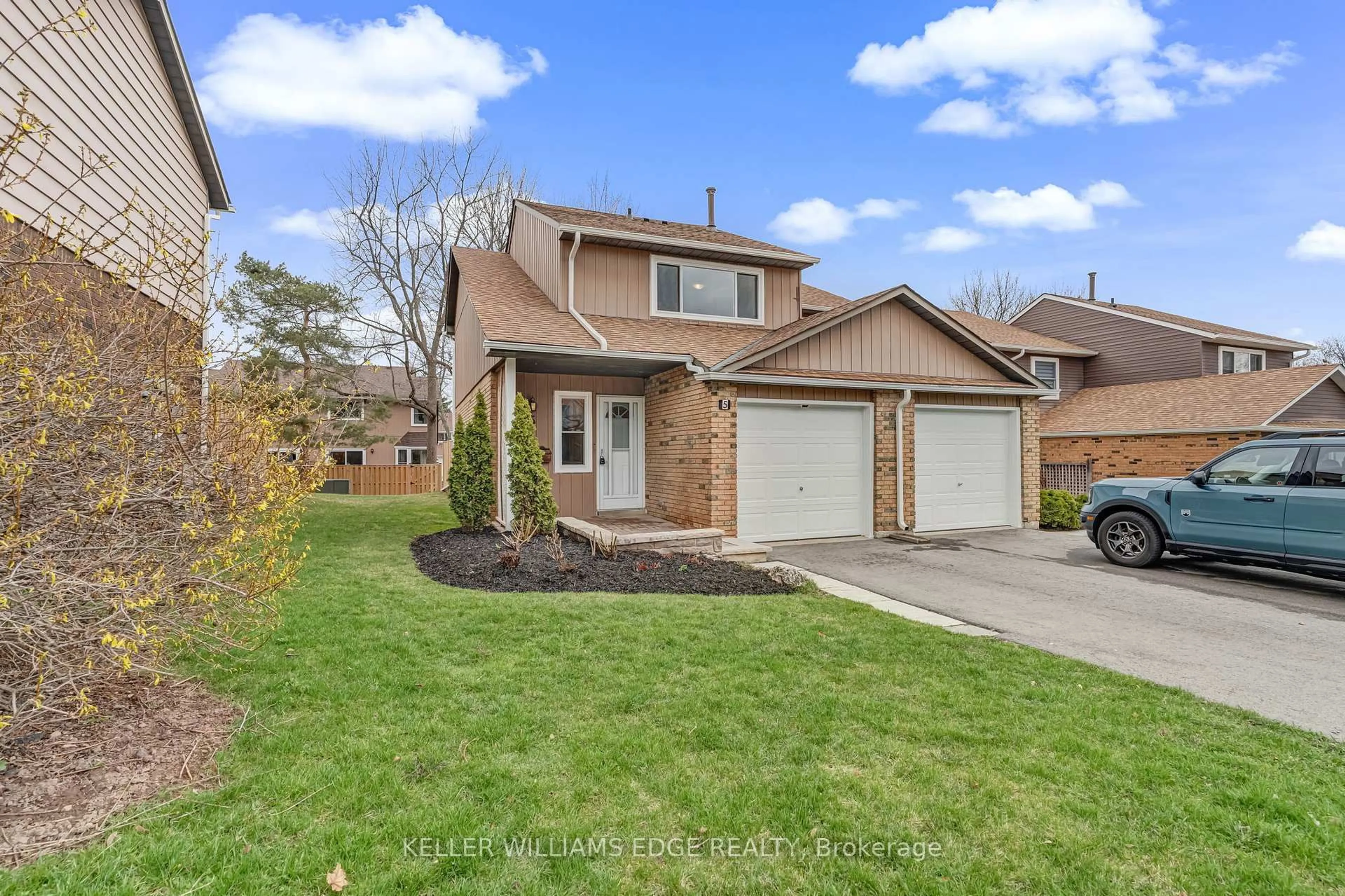 Home with brick exterior material, street for 2185 Fairchild Blvd #5, Burlington Ontario L7P 3P6