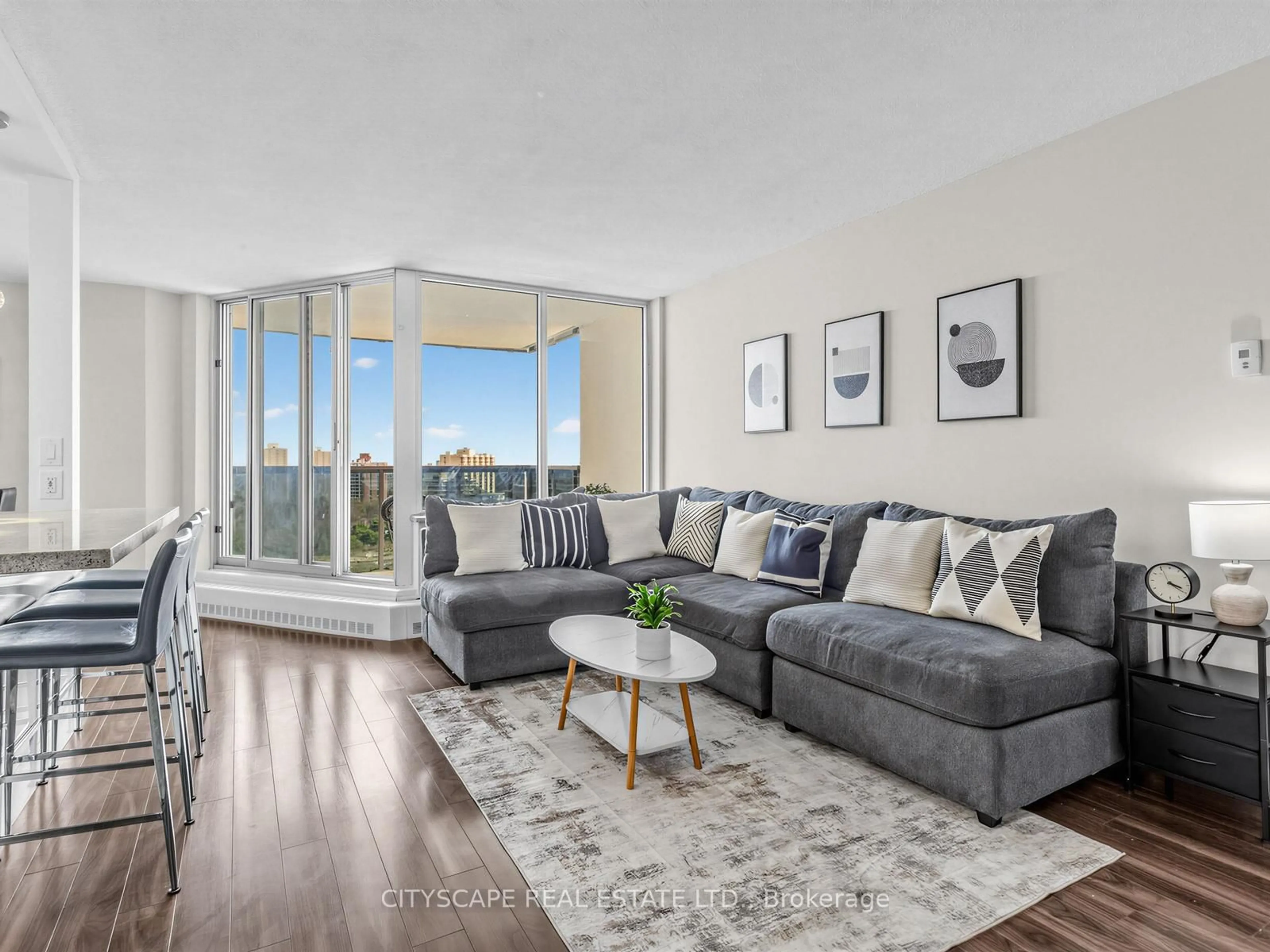 Living room with furniture, unknown for 420 Mill Rd #1702, Toronto Ontario M9C 1Z1