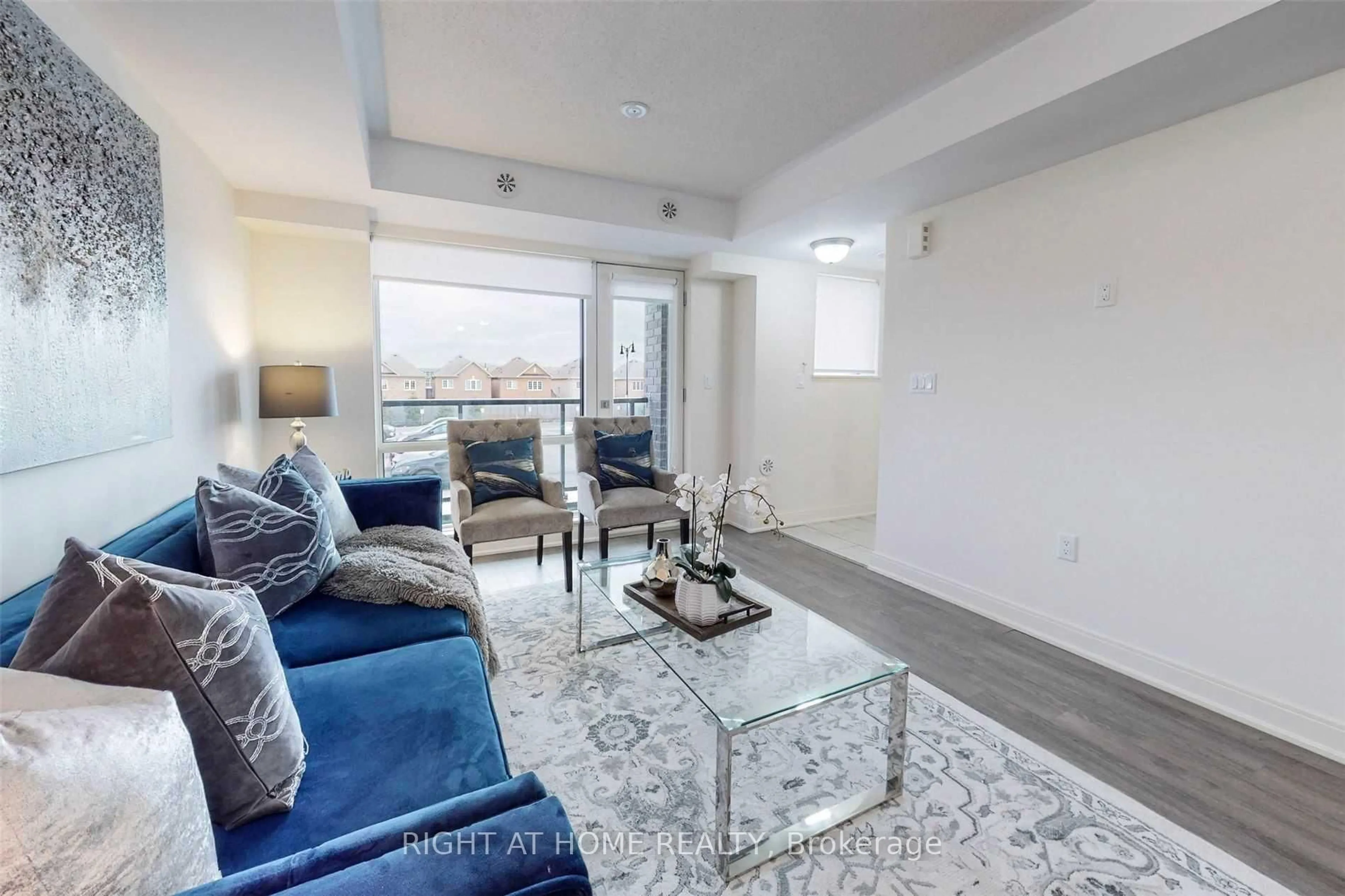 Living room with furniture, unknown for 100 Dufay Rd #82, Brampton Ontario L7A 4S3