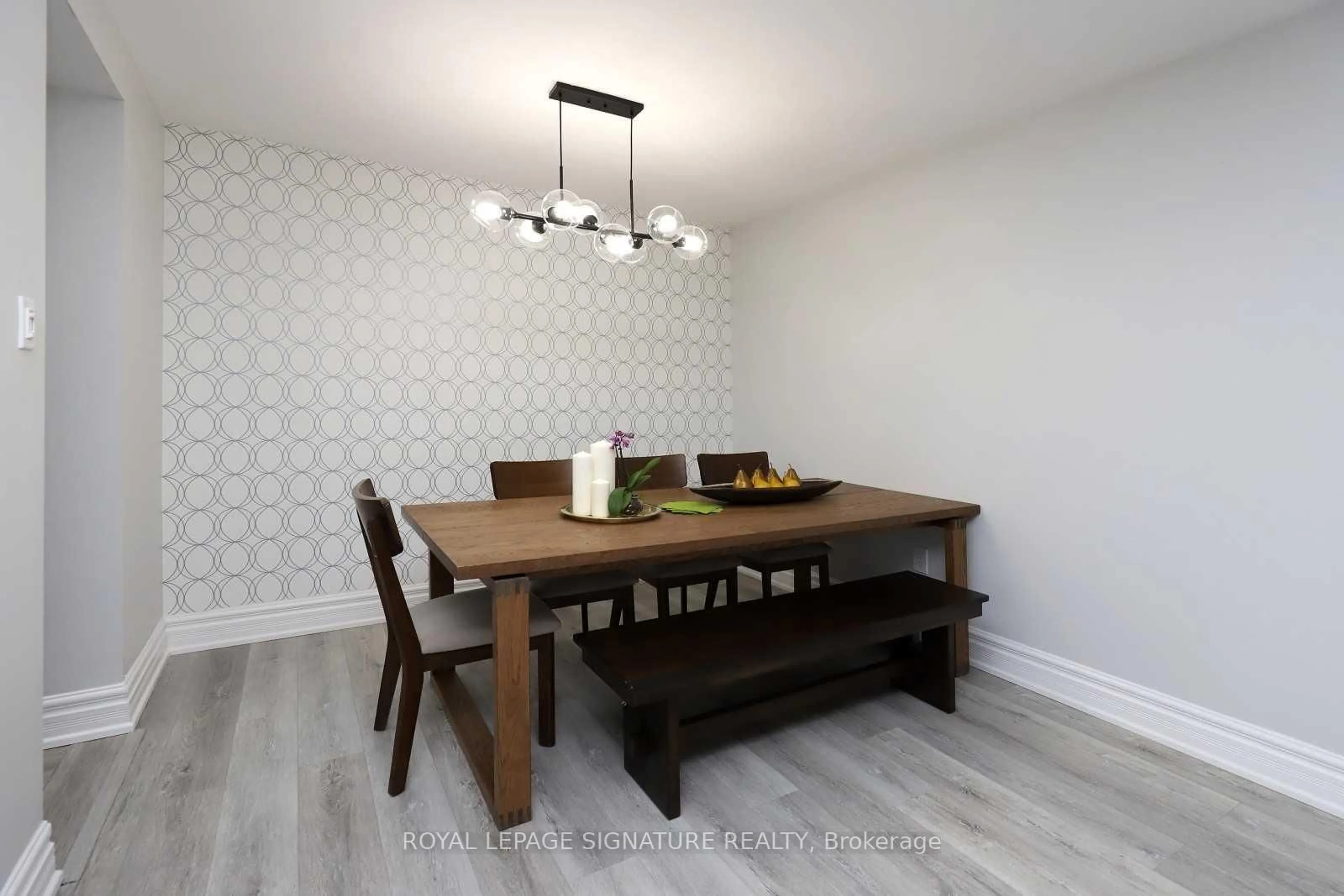 Dining room, wood/laminate floor for 100 County Court Blvd #1101, Brampton Ontario L6W 3X1