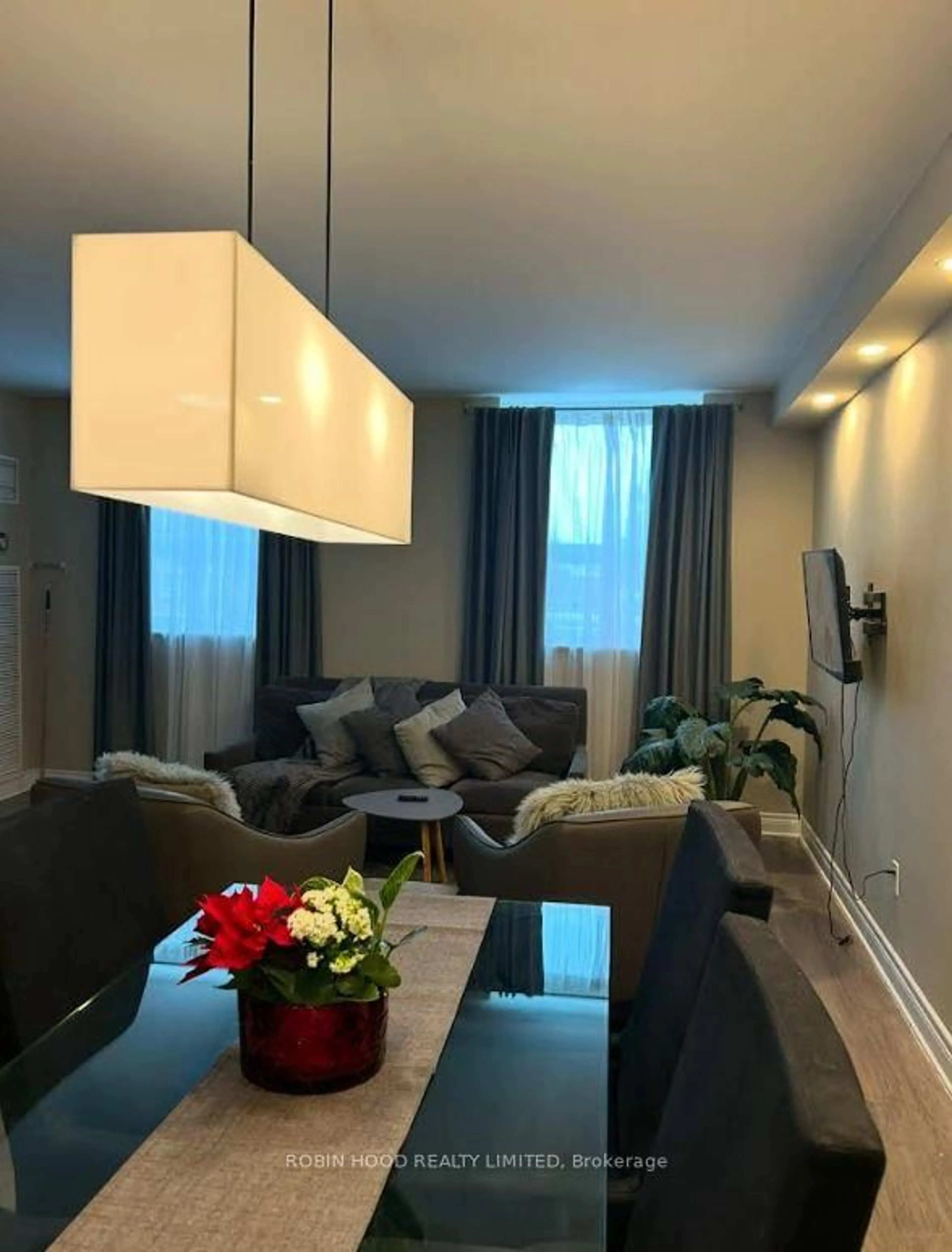 Living room with furniture, unknown for 4 Lisa St #103, Brampton Ontario L6T 4B6