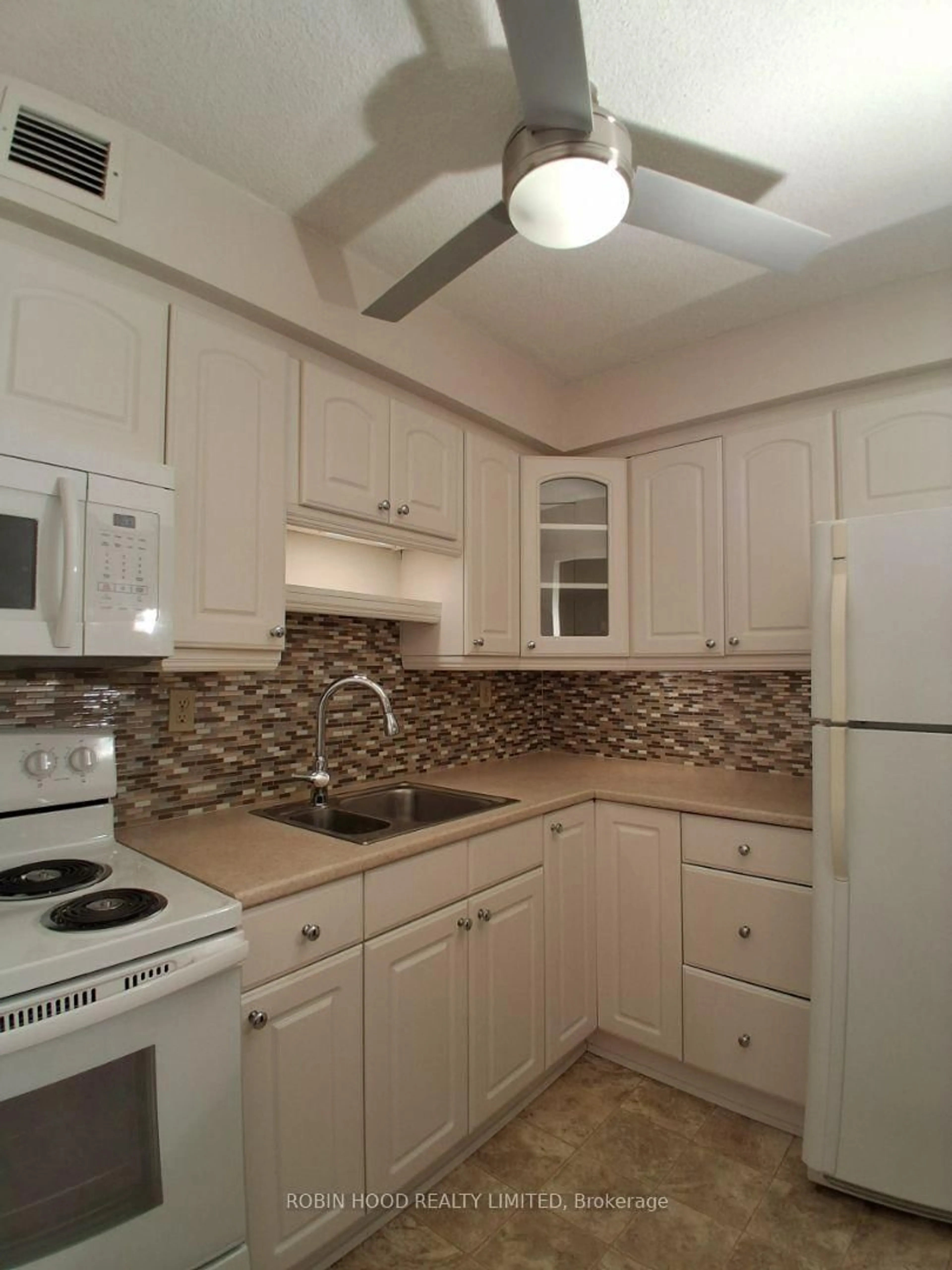 Standard kitchen, ceramic/tile floor for 975 Warwick Crt #605, Burlington Ontario L7T 3Z7