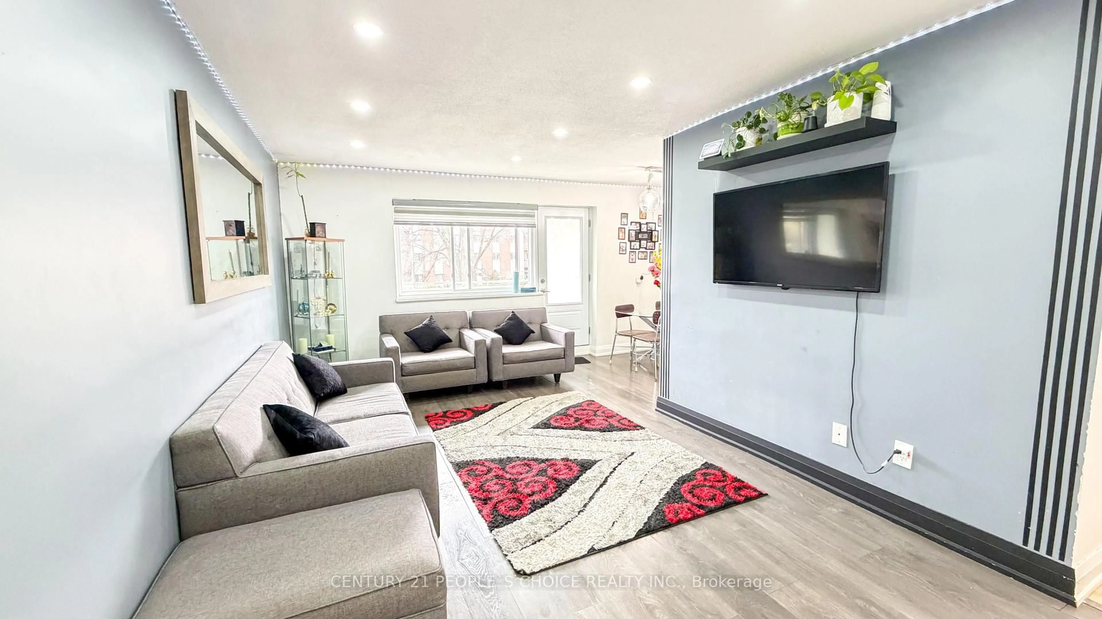 Living room with furniture, unknown for 2485 Woking Cres #201, Mississauga Ontario L5K 1Z6