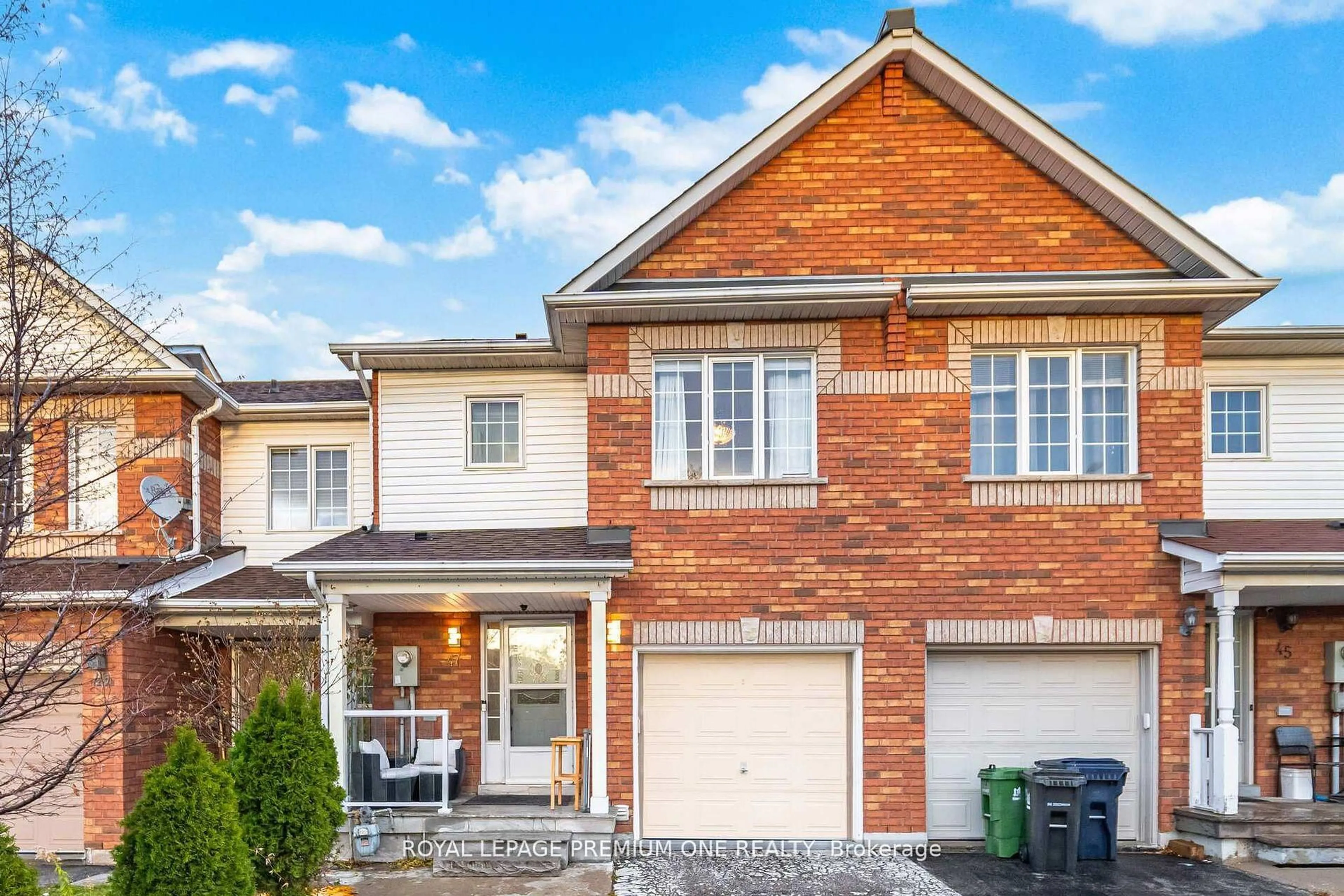 Home with brick exterior material, street for 47 Triple Crown Ave, Toronto Ontario M9W 7E5