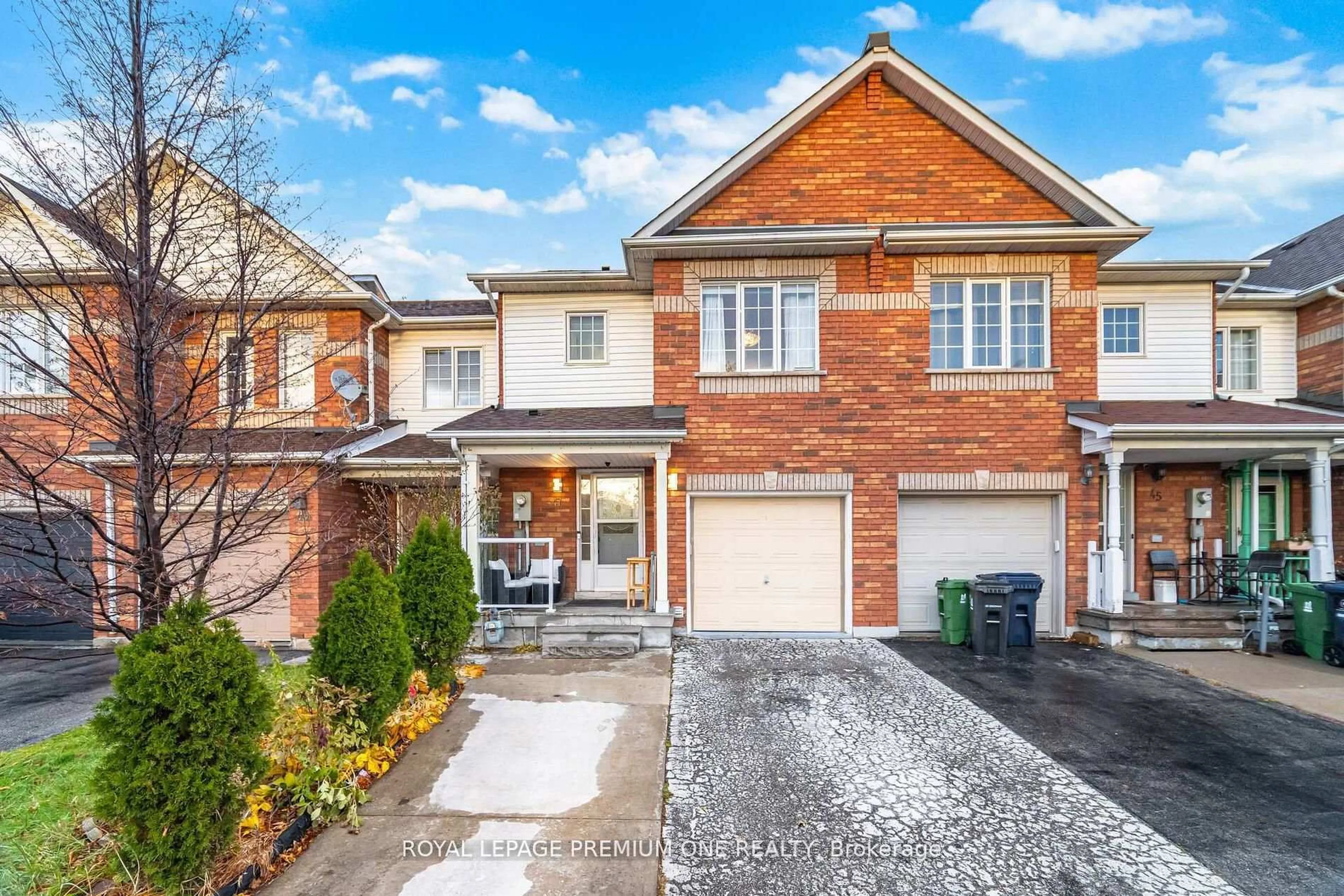 Home with brick exterior material, street for 47 Triple Crown Ave, Toronto Ontario M9W 7E5