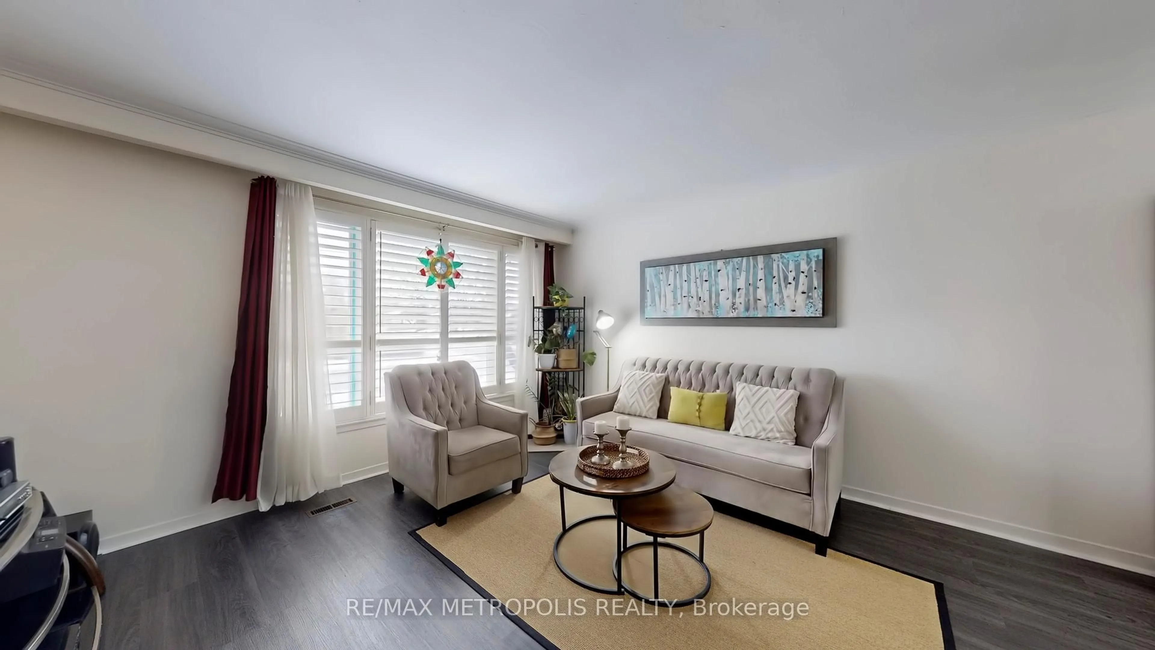 Living room with furniture, wood/laminate floor for 68 Paulvale Cres, Toronto Ontario M3J 1K5