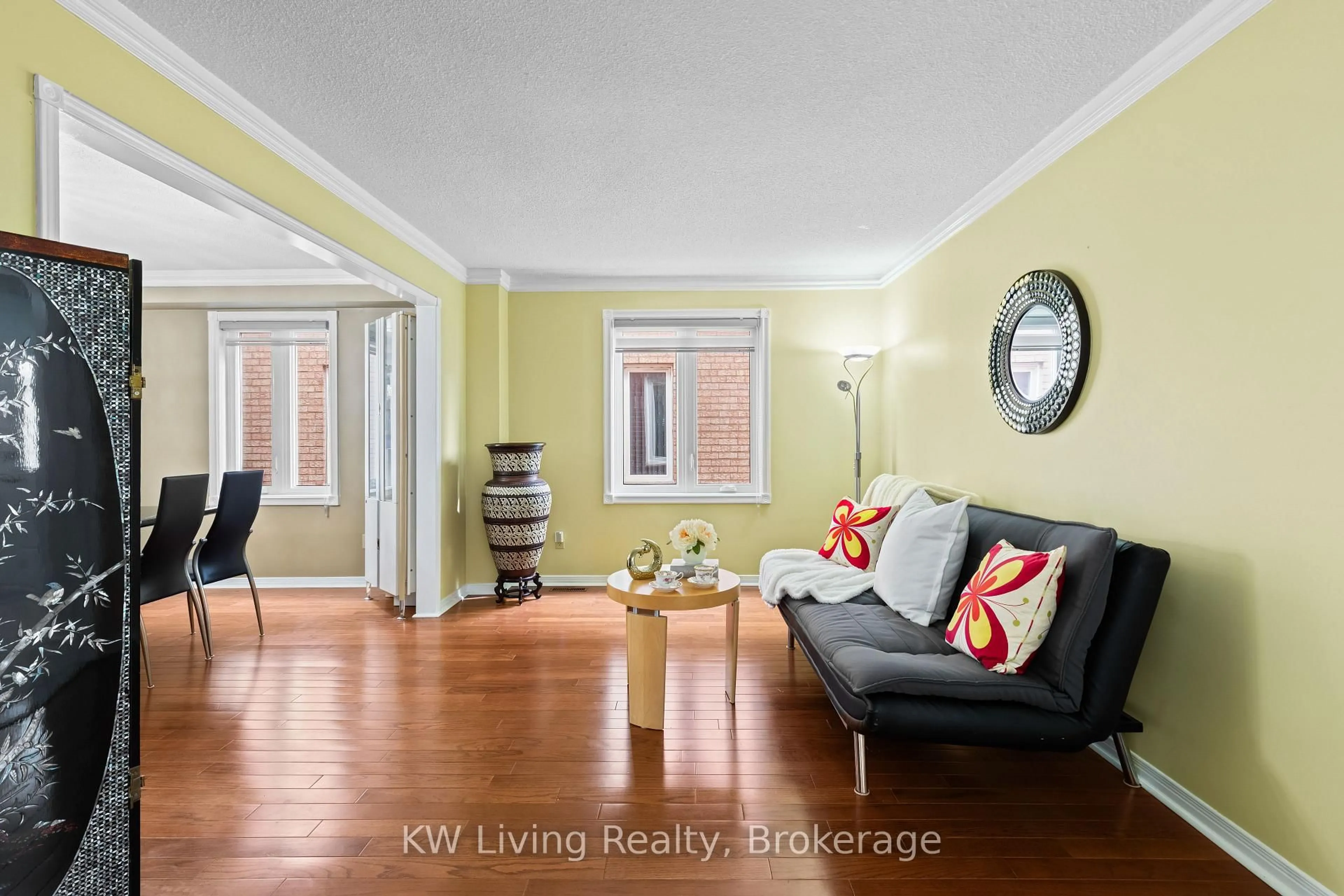 Living room with furniture, wood/laminate floor for 517 Mallorytown Ave, Mississauga Ontario L4Z 2N2