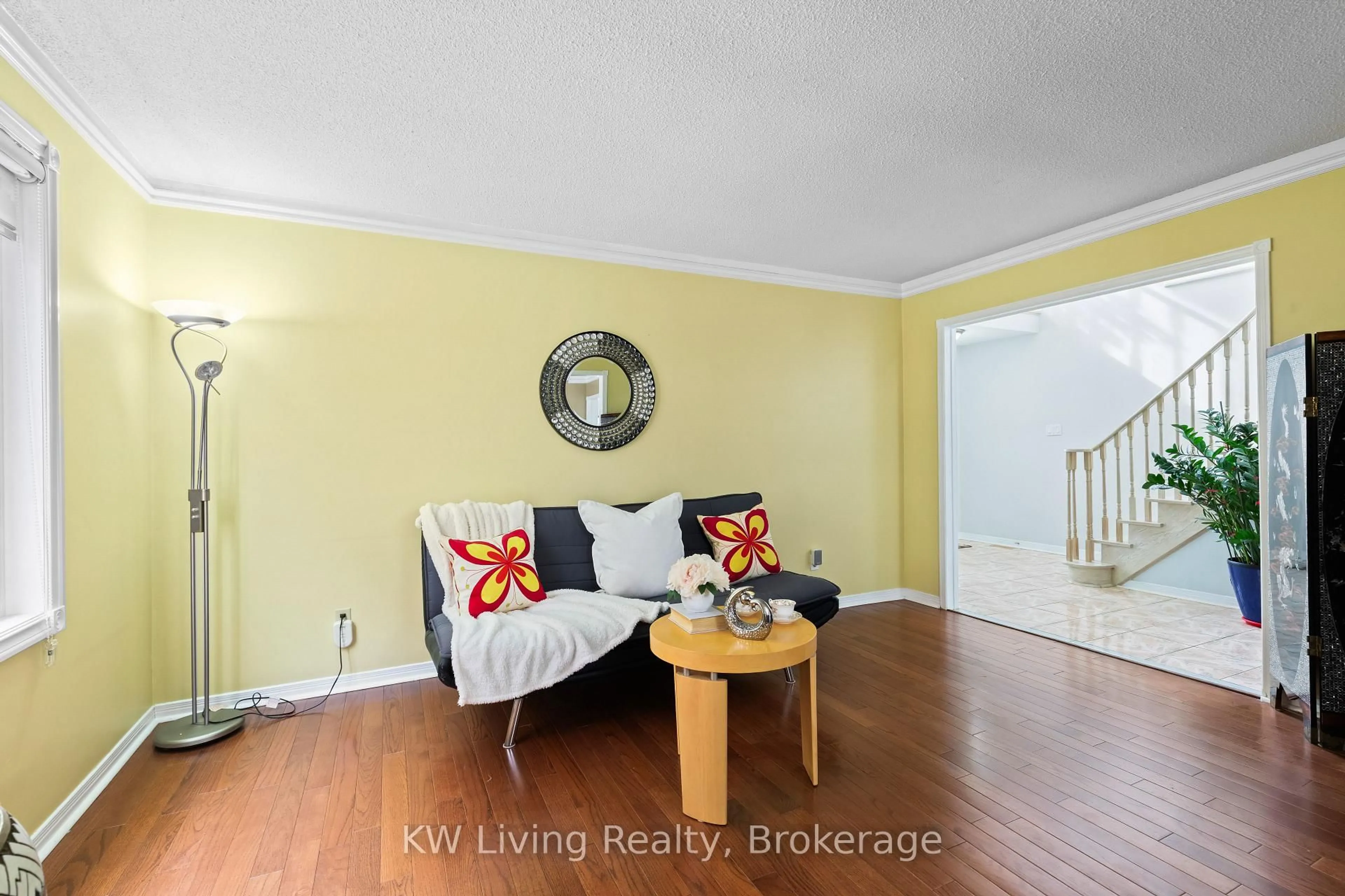 Living room with furniture, wood/laminate floor for 517 Mallorytown Ave, Mississauga Ontario L4Z 2N2