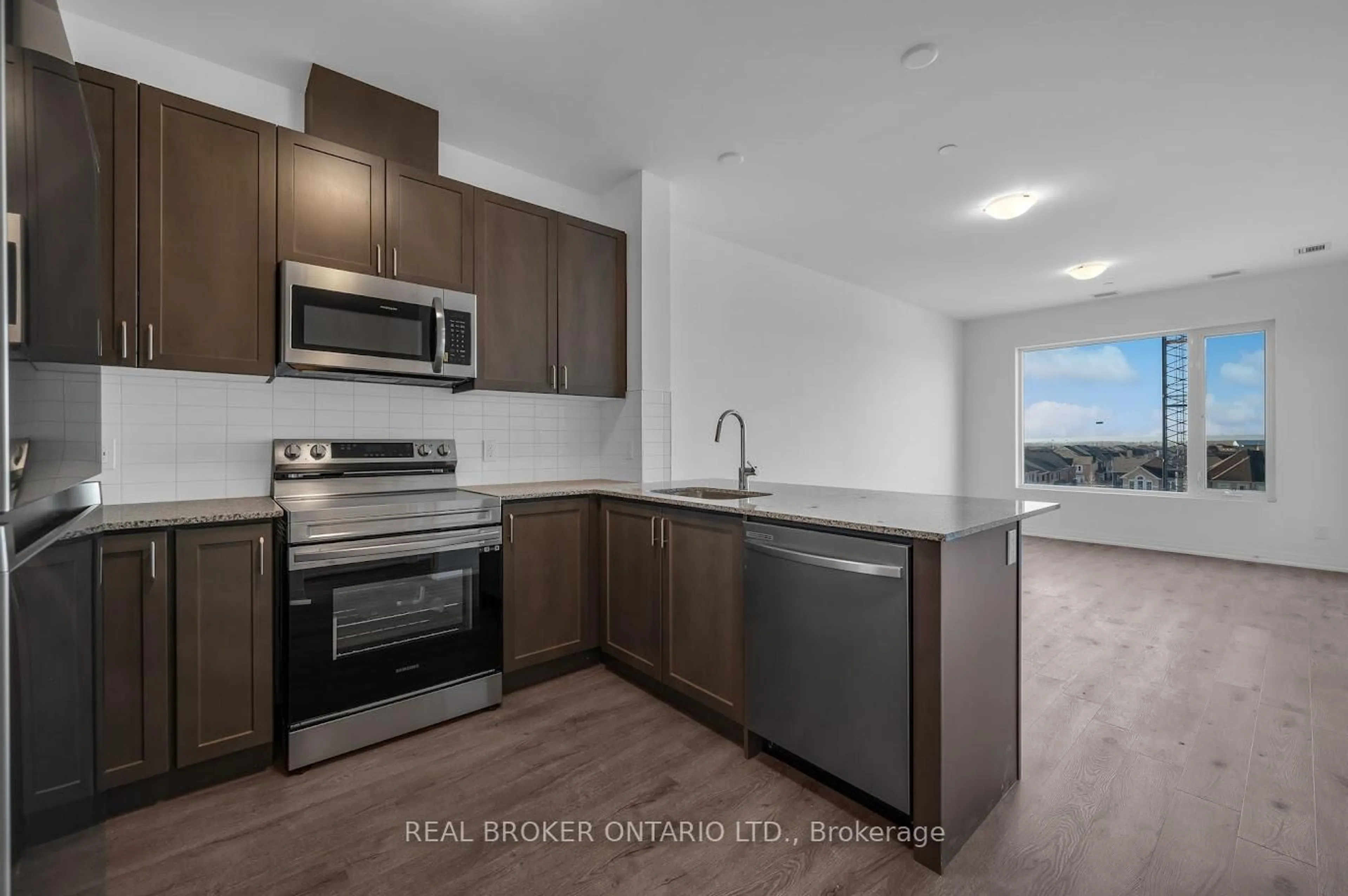 Open concept kitchen, unknown for 3265 Carding Mill Tr #412, Oakville Ontario L6M 0W6
