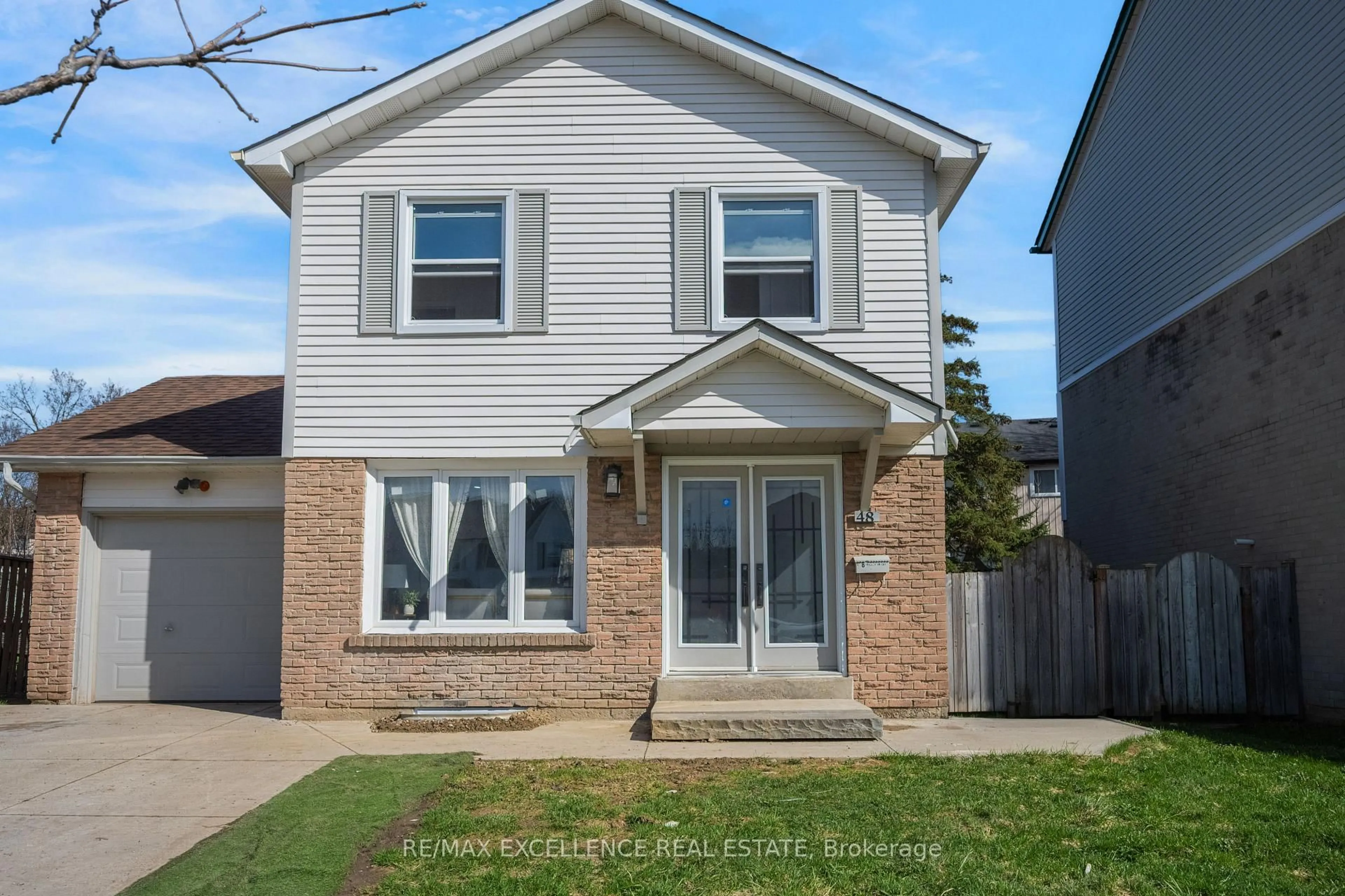 Home with brick exterior material, street for 48 Traverston Crt, Brampton Ontario L6Z 1C9