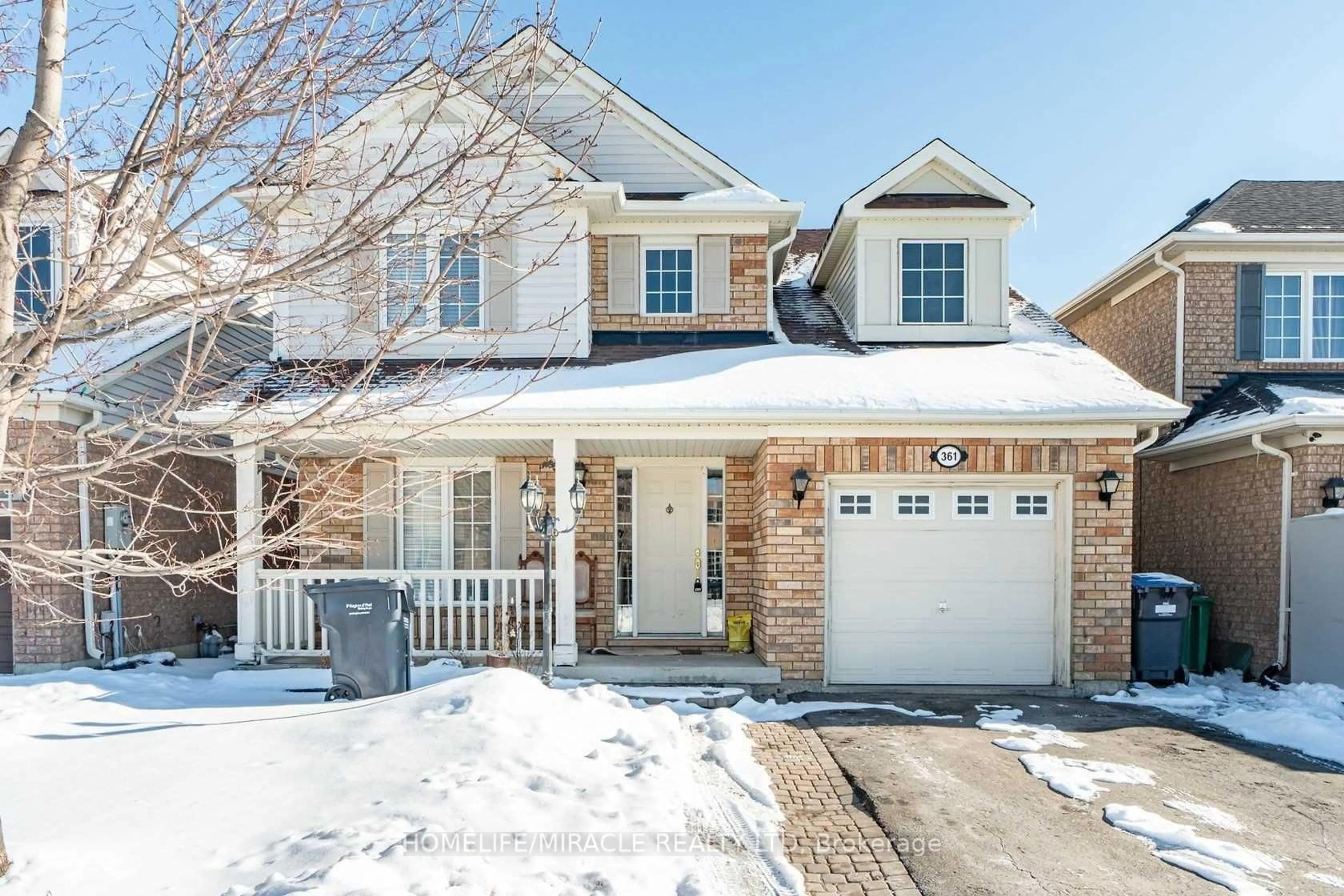 Home with brick exterior material, street for 361 Brisdale Dr, Brampton Ontario L7A 3M6