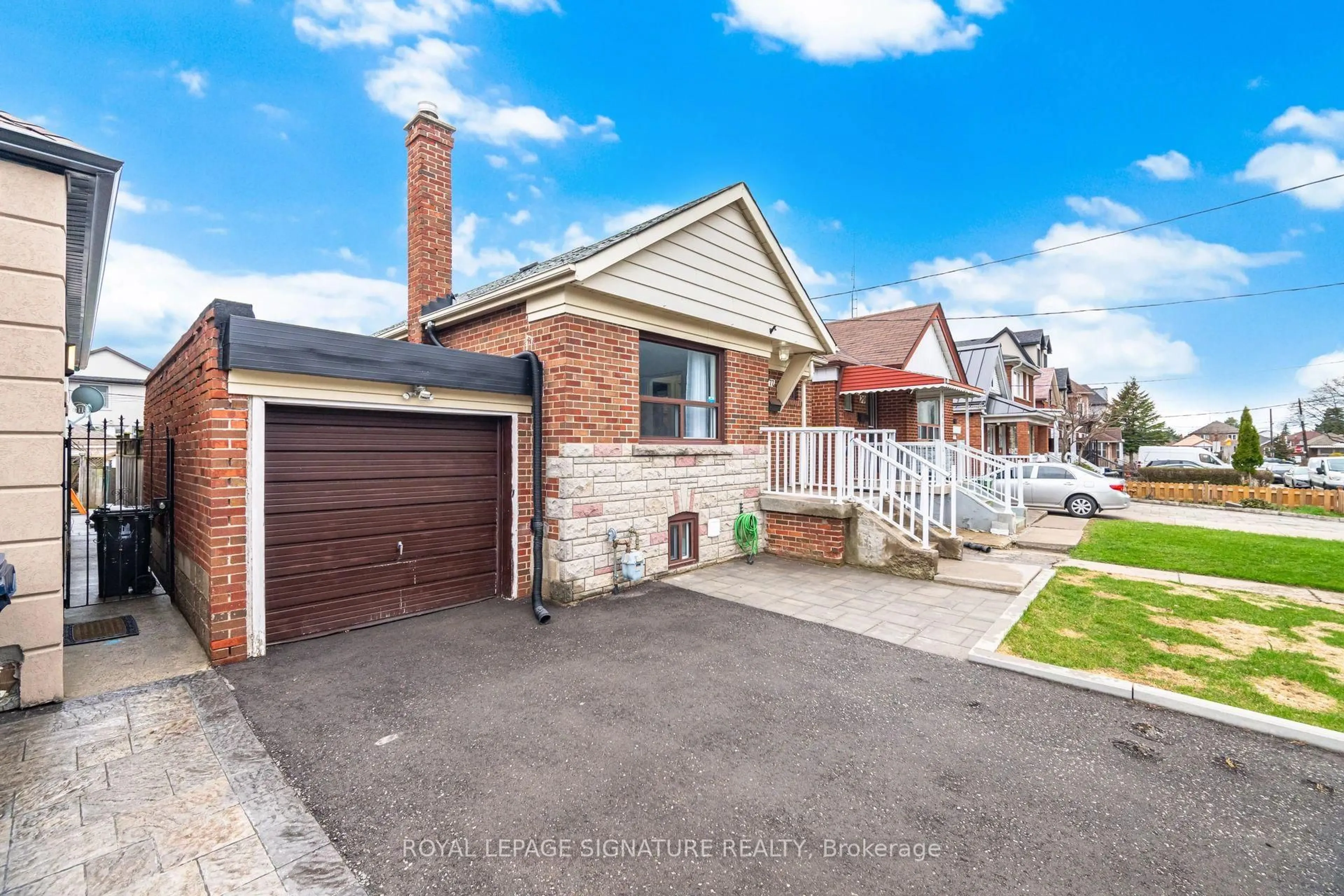 Home with brick exterior material, street for 77 Ypres Rd, Toronto Ontario M6M 1P2