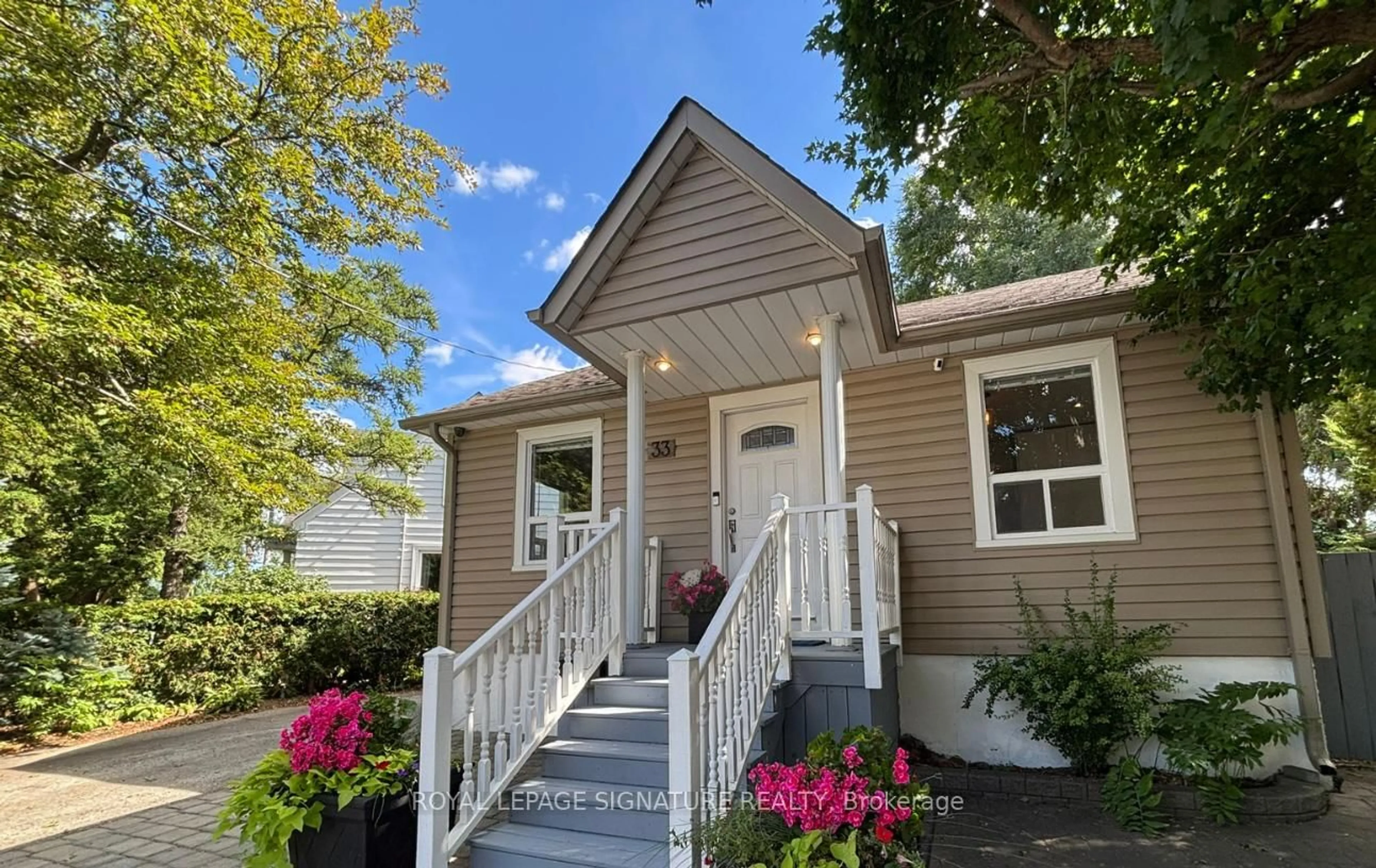 Home with vinyl exterior material, street for 33 Cochrane Dr, Toronto Ontario M8Z 3Z4