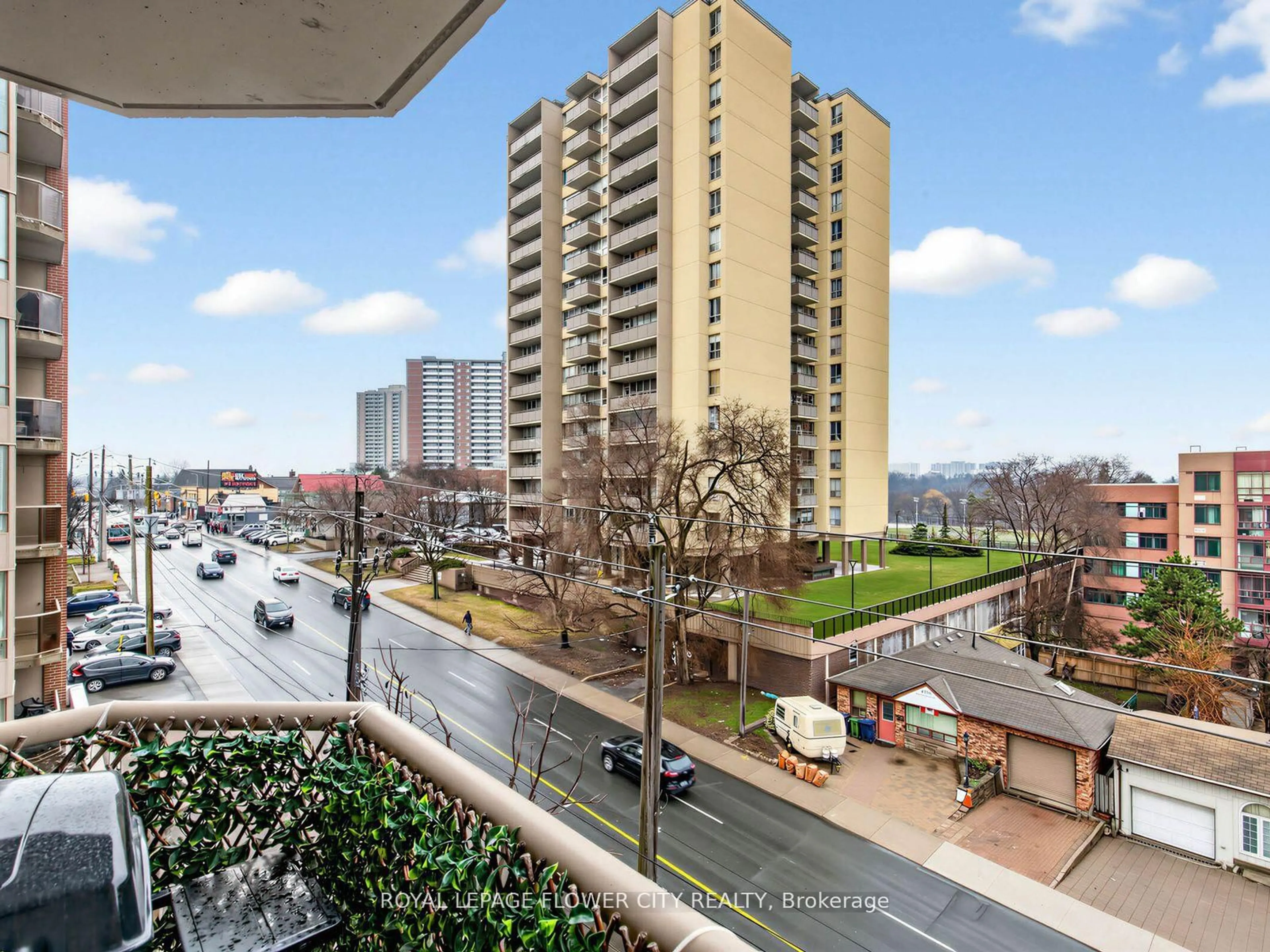 Balcony in the apartment, city buildings view from balcony for 2088 Lawrence Ave #404, Toronto Ontario M9N 1J1