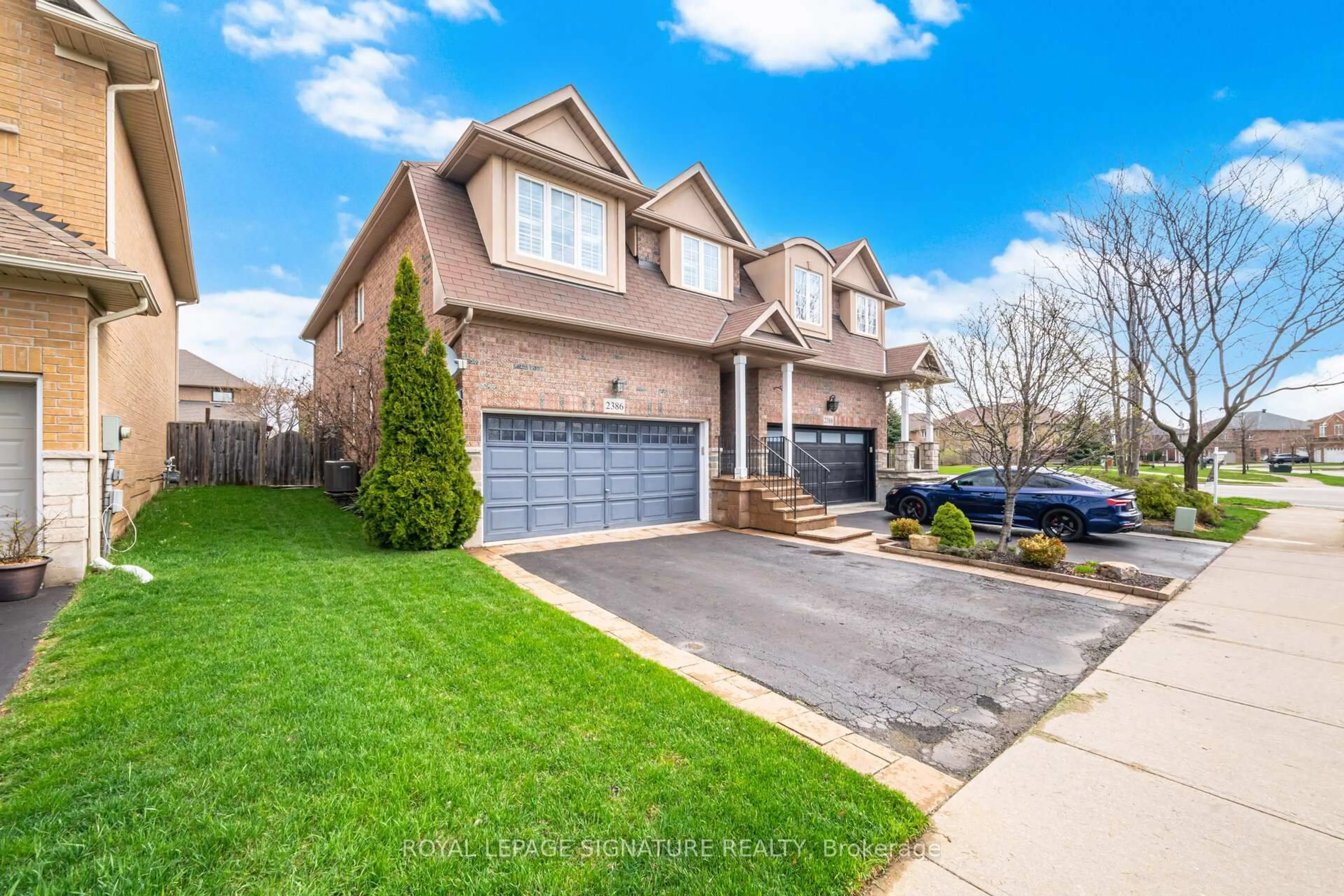 Home with brick exterior material, street for 2386 Stone Glen Cres, Oakville Ontario L6M 0C7