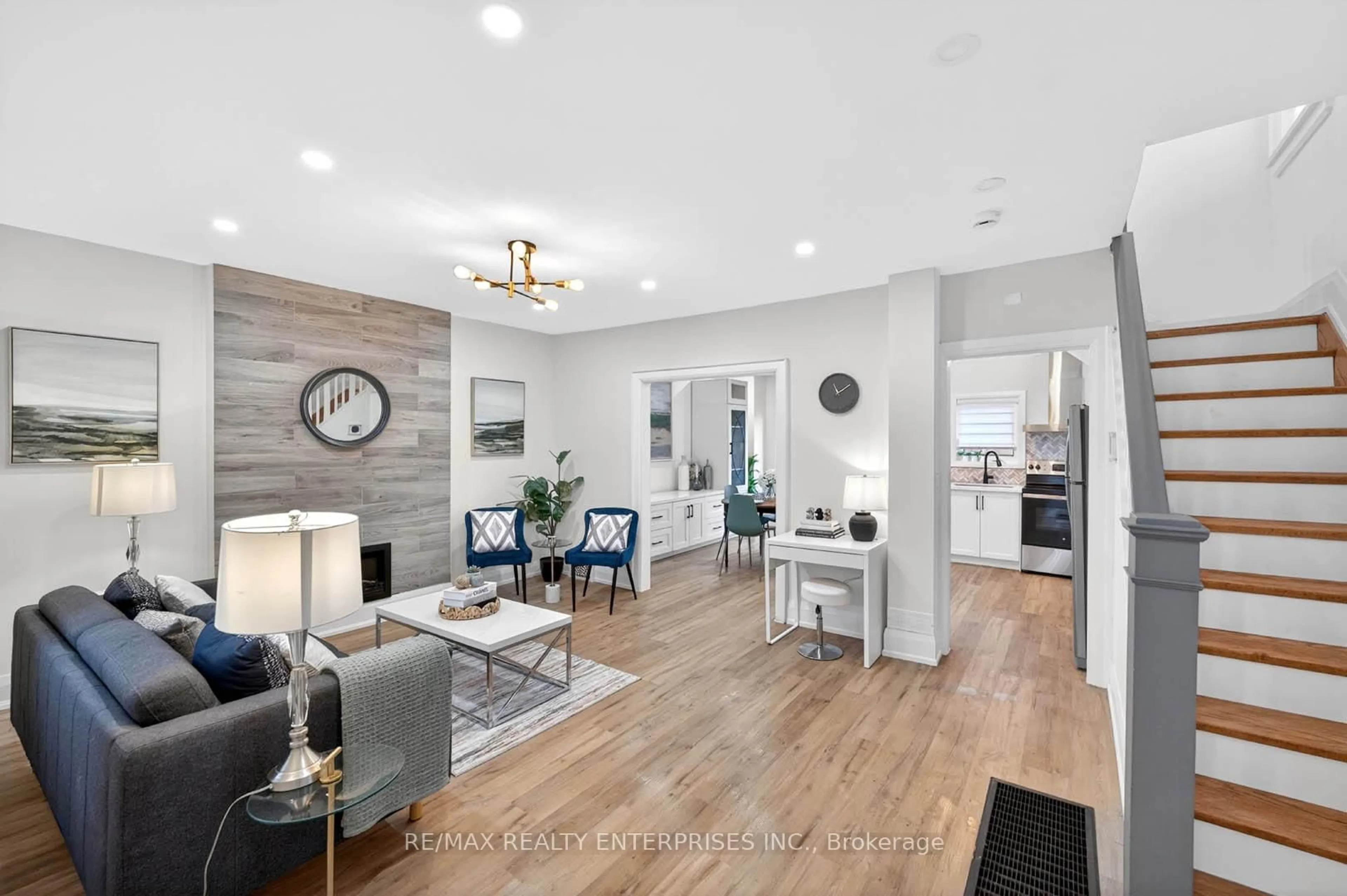 Living room with furniture, wood/laminate floor for 41 Greenlaw Ave, Toronto Ontario M6H 3V7