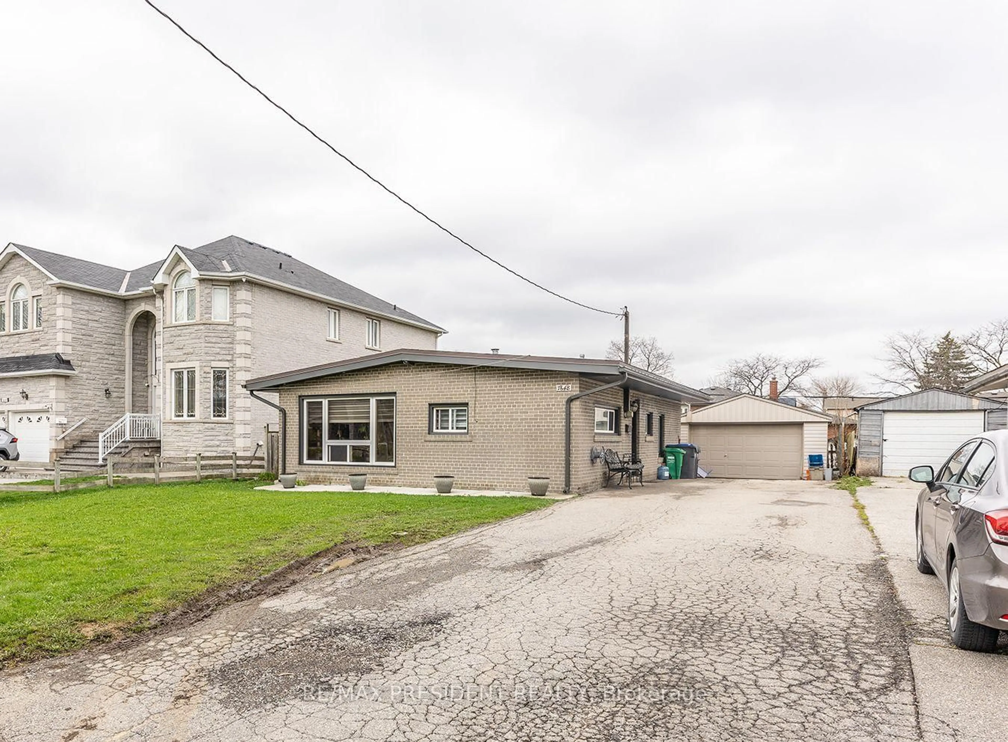 A pic from outside/outdoor area/front of a property/back of a property/a pic from drone, street for 7648 Redstone Rd, Mississauga Ontario L4T 2B9