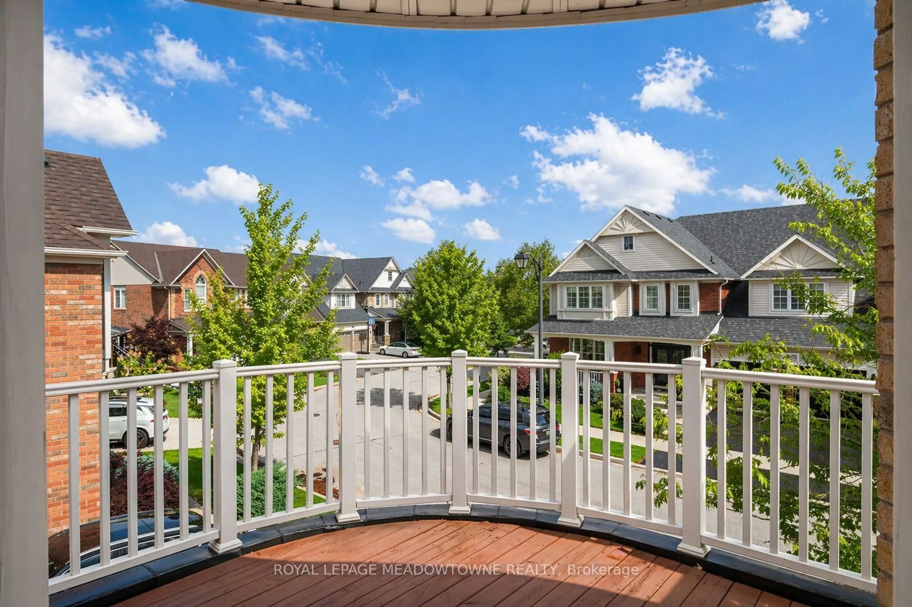 Patio, city buildings view from balcony for 720 Lingen Cres, Milton Ontario L9T 0E5