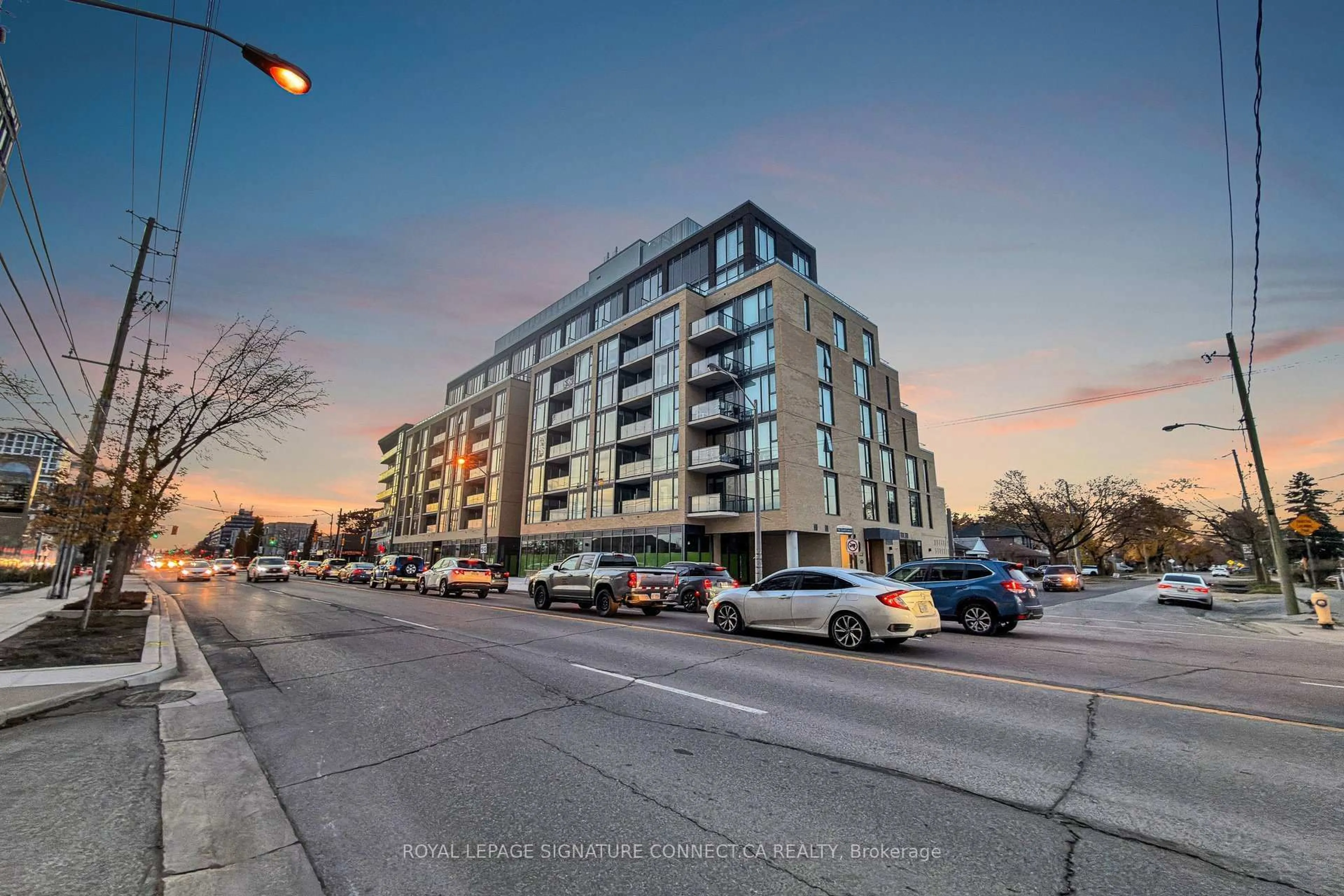 A pic from outside/outdoor area/front of a property/back of a property/a pic from drone, street for 6 Chartwell Rd #208, Toronto Ontario M8Z 0H2