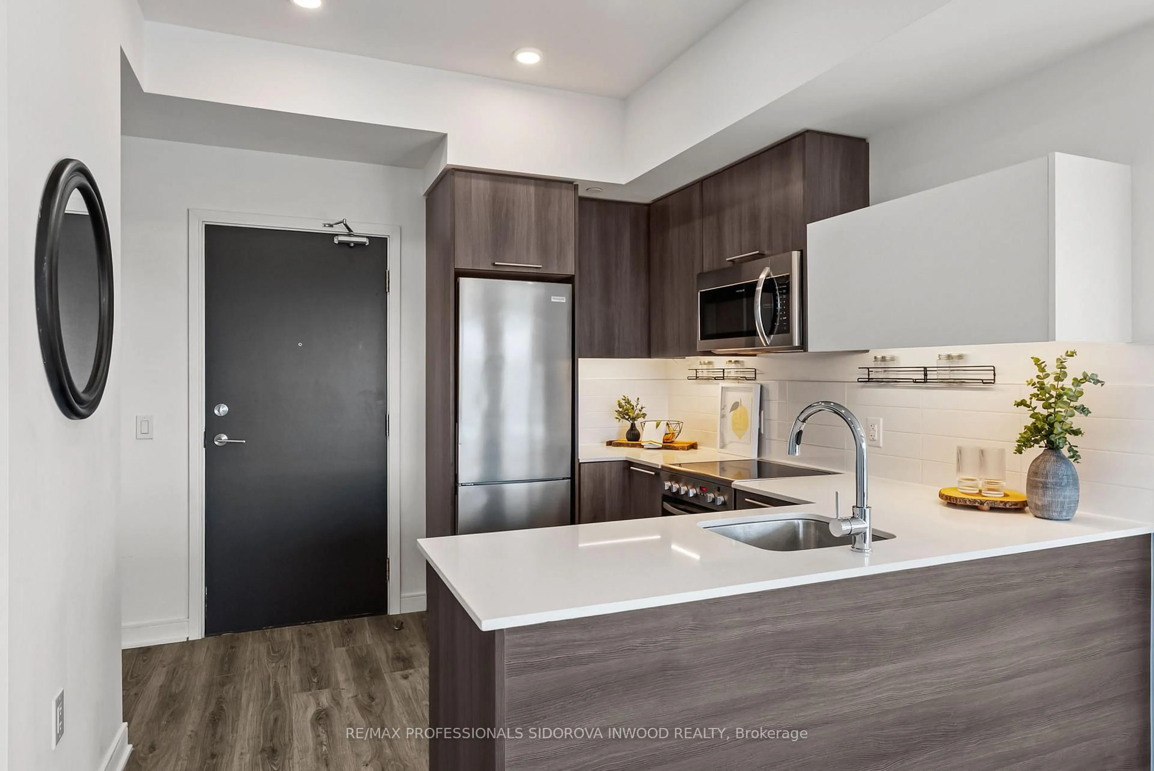 Open concept kitchen, unknown for 25 Neighbourhood Lane #905, Toronto Ontario M8Y 0C3