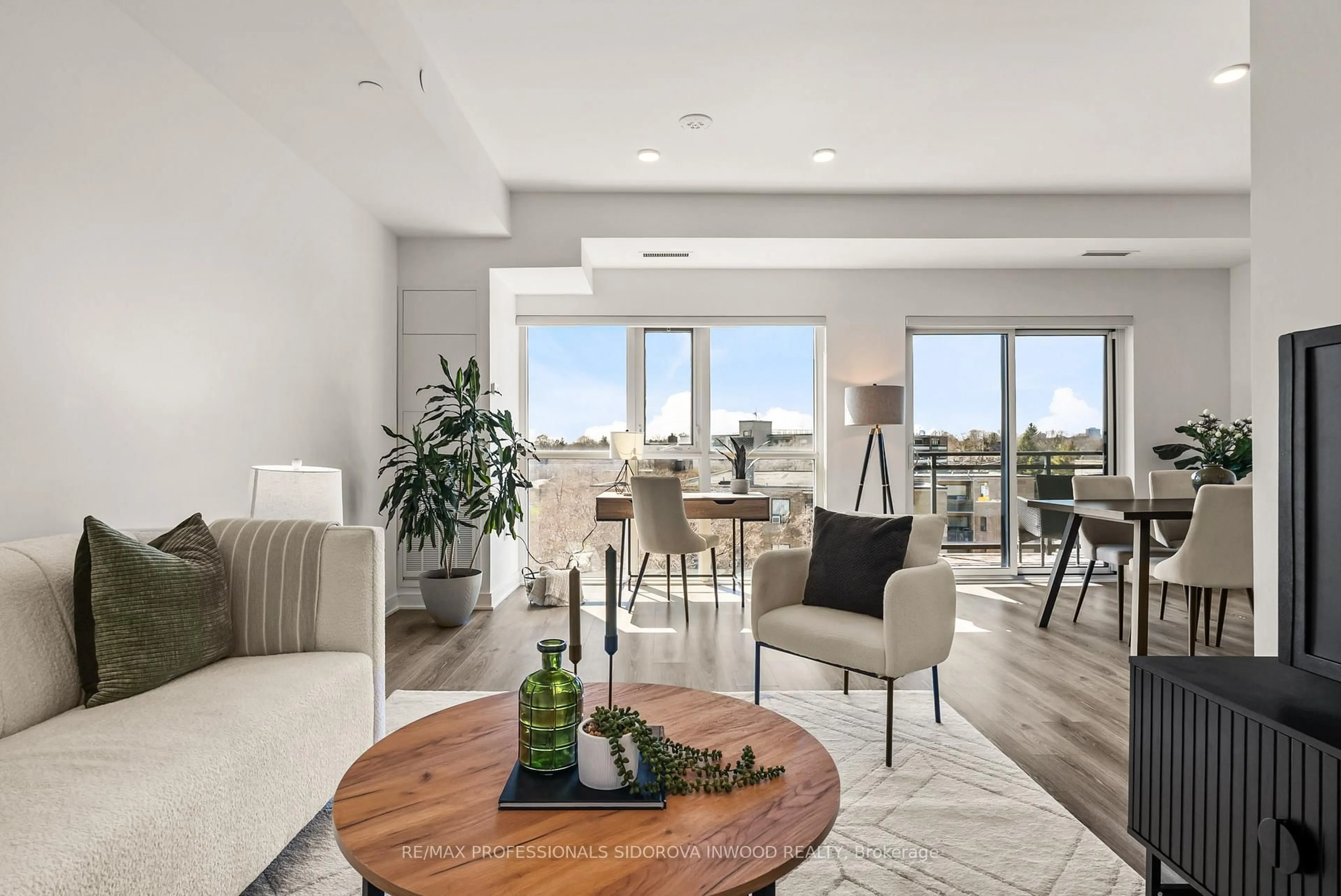 Living room with furniture, unknown for 25 Neighbourhood Lane #905, Toronto Ontario M8Y 0C3