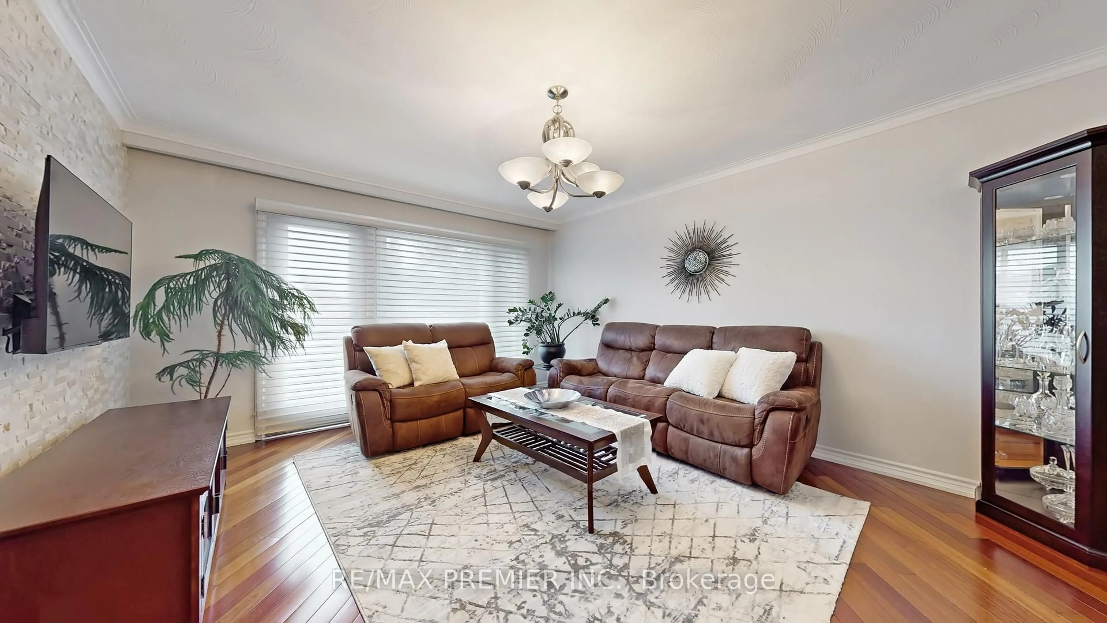 Living room with furniture, wood/laminate floor for 9 Tilden Cres, Toronto Ontario M9P 1V6