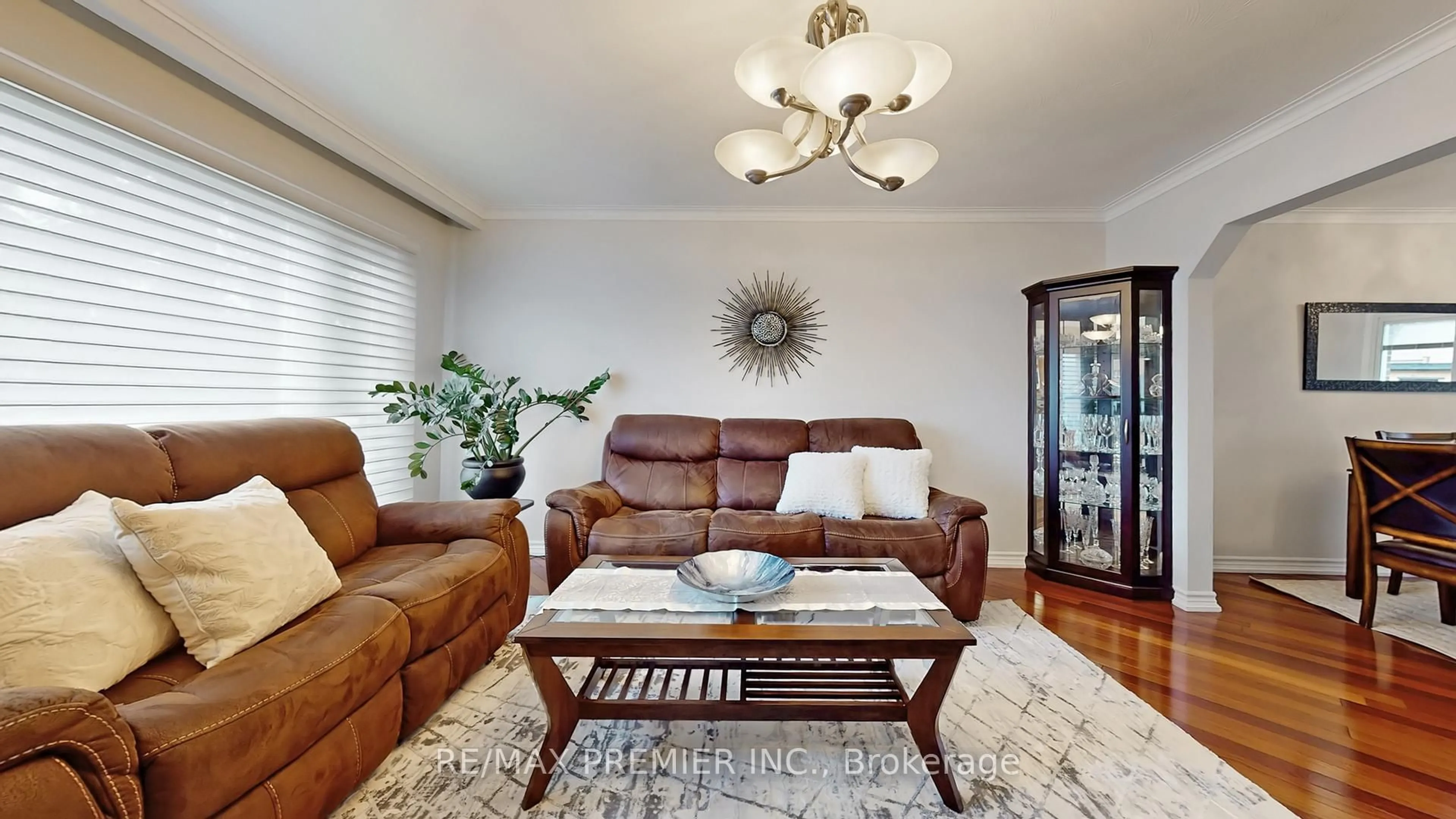 Living room with furniture, wood/laminate floor for 9 Tilden Cres, Toronto Ontario M9P 1V6