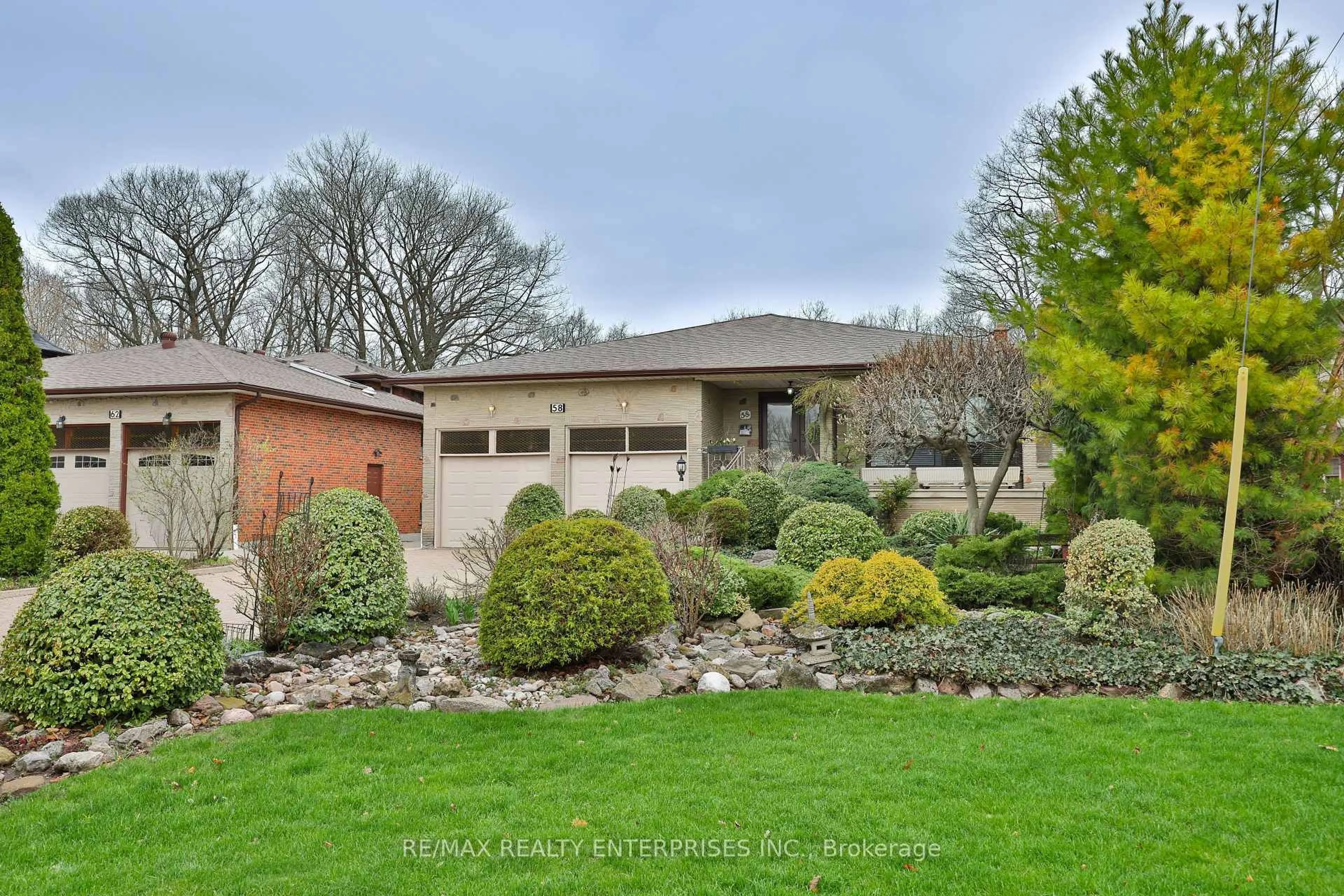 Home with brick exterior material, street for 58 North Park Dr, Toronto Ontario M6L 1K2