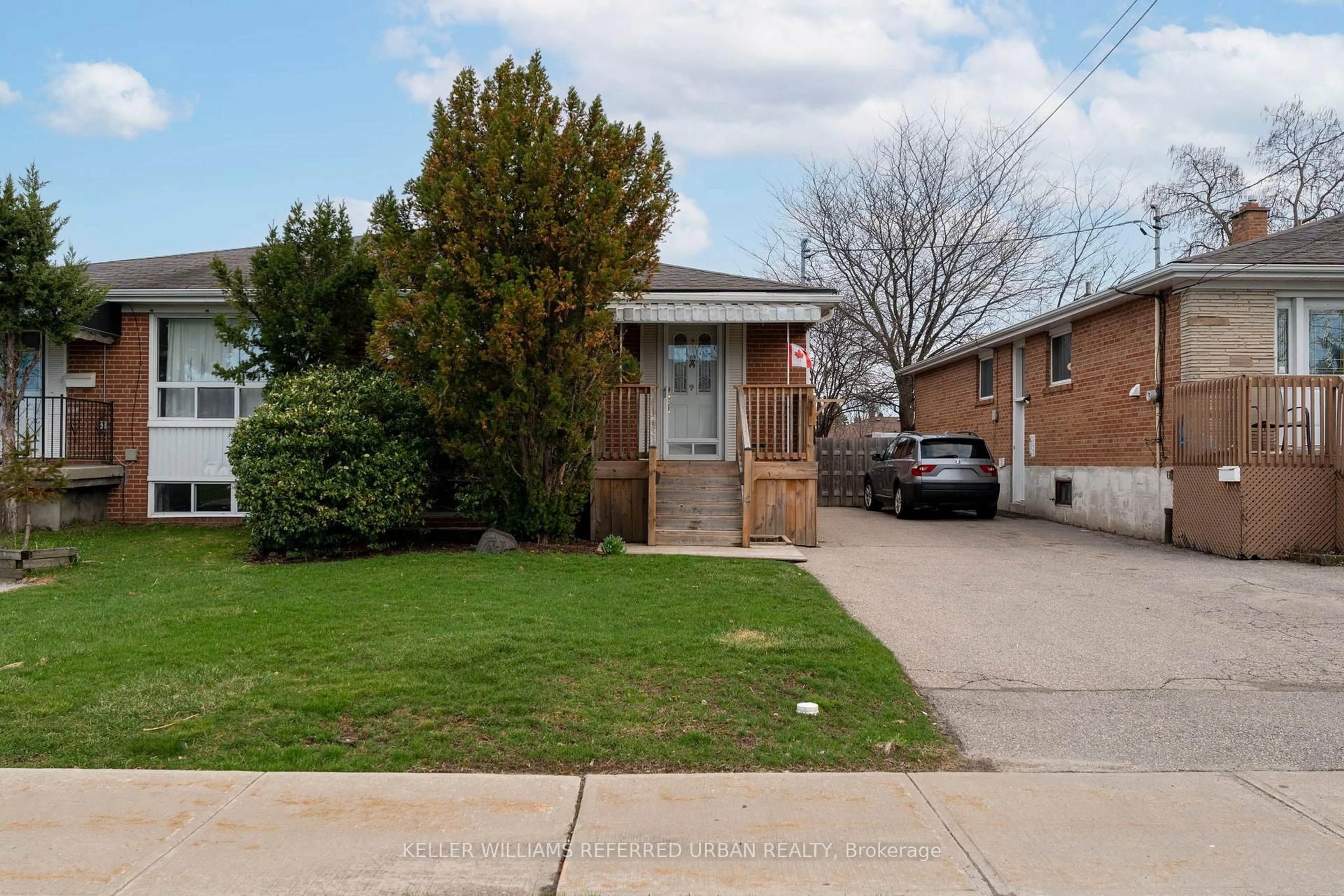 Home with brick exterior material, street for 49 Navenby Cres, Toronto Ontario M9L 1B3