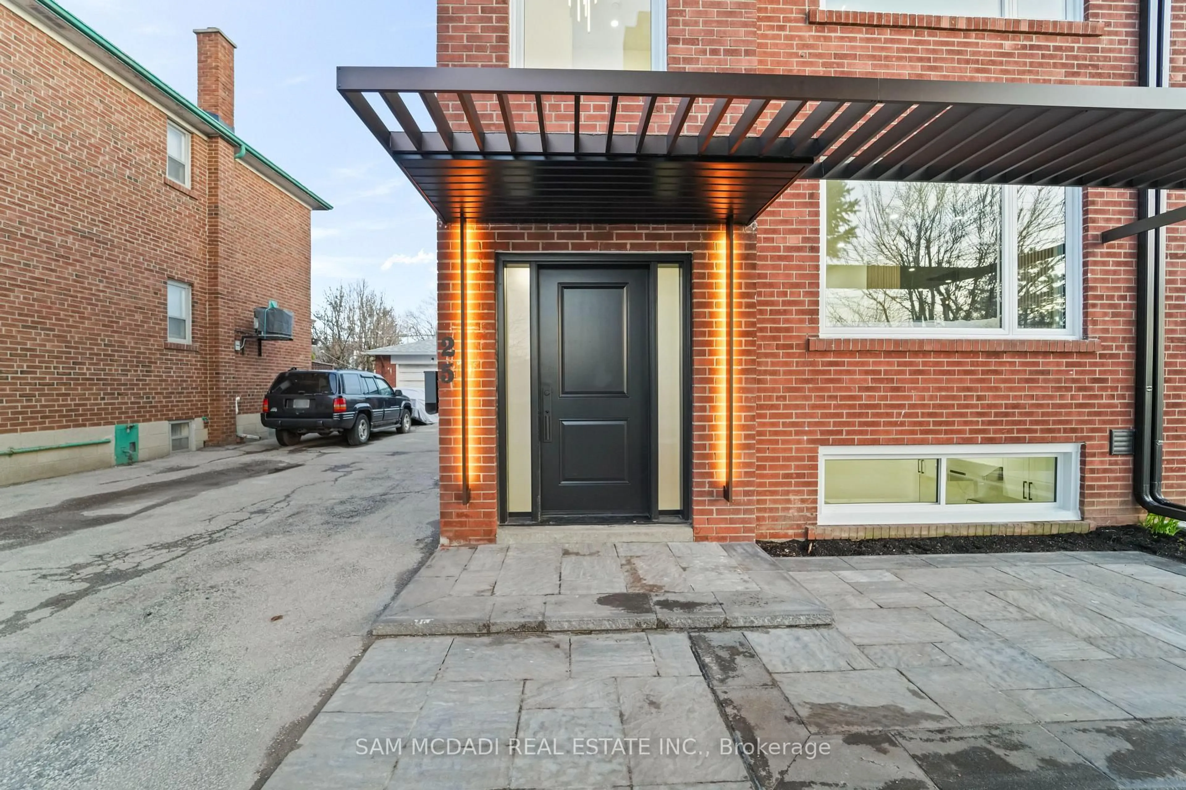 Home with brick exterior material, street for 25 Falstaff Ave, Toronto Ontario M6L 2C6