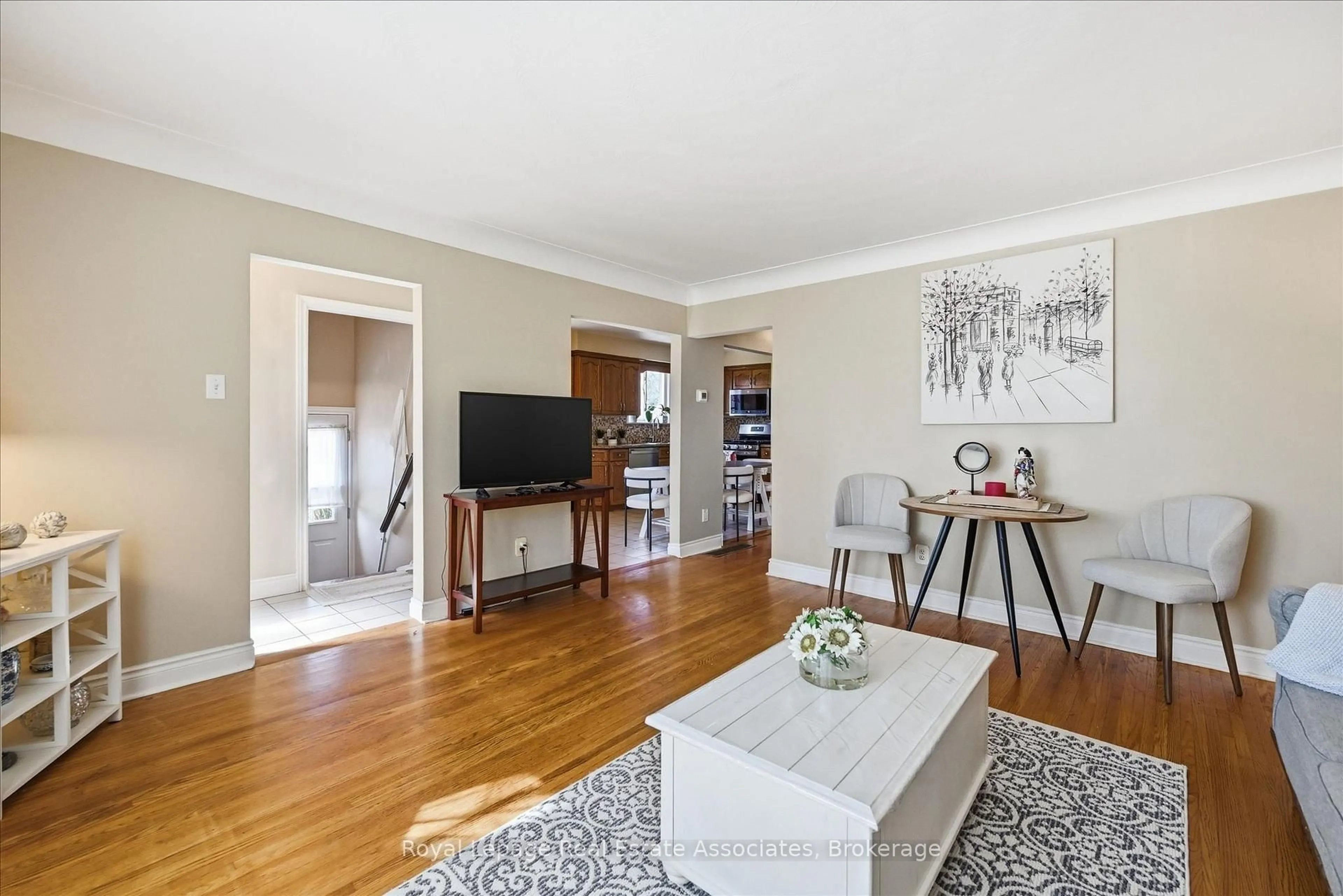 Living room with furniture, wood/laminate floor for 1131 Stanley Dr, Burlington Ontario L7P 2K6