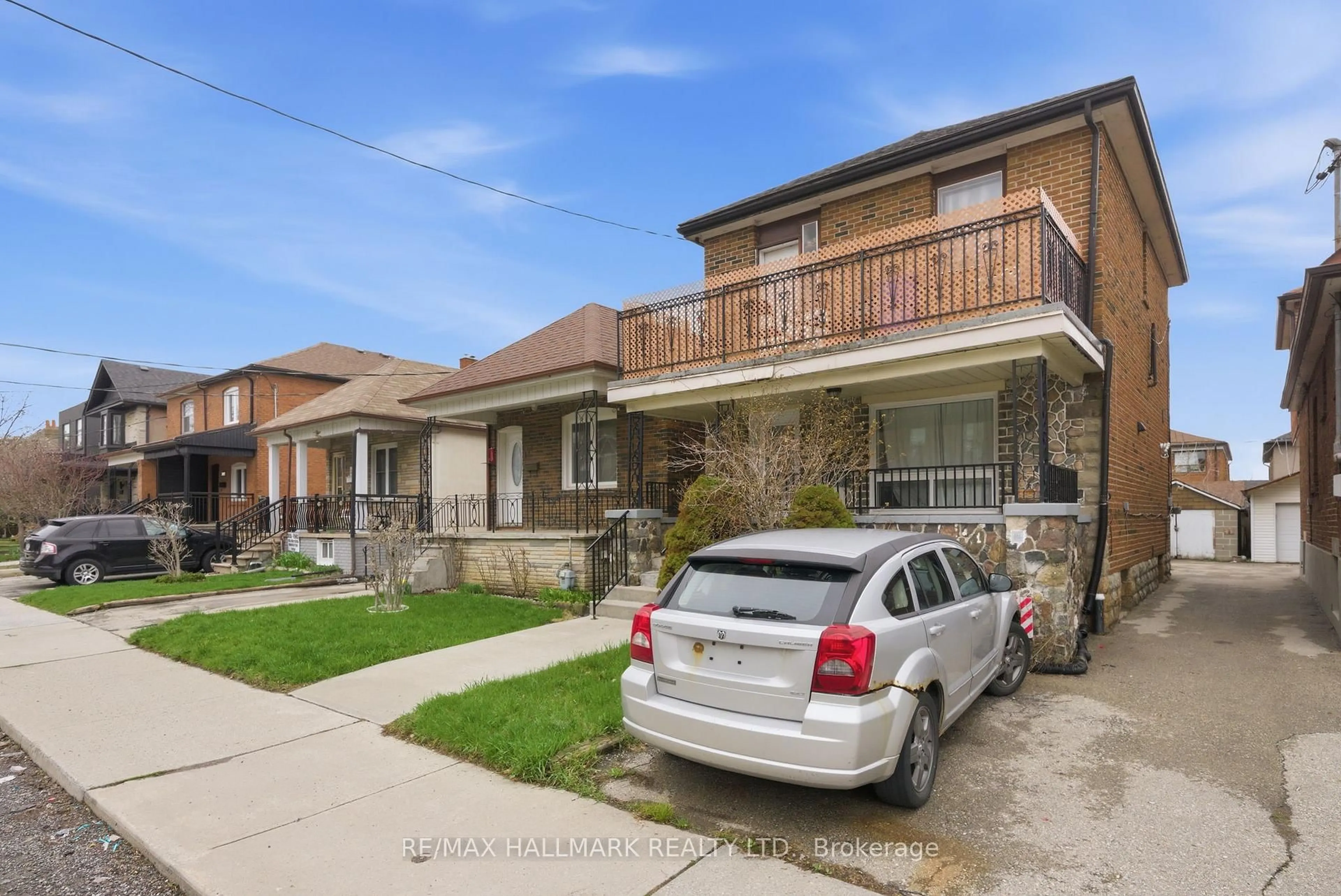Home with brick exterior material, street for 196 Livingstone Ave, Toronto Ontario M6E 2M2
