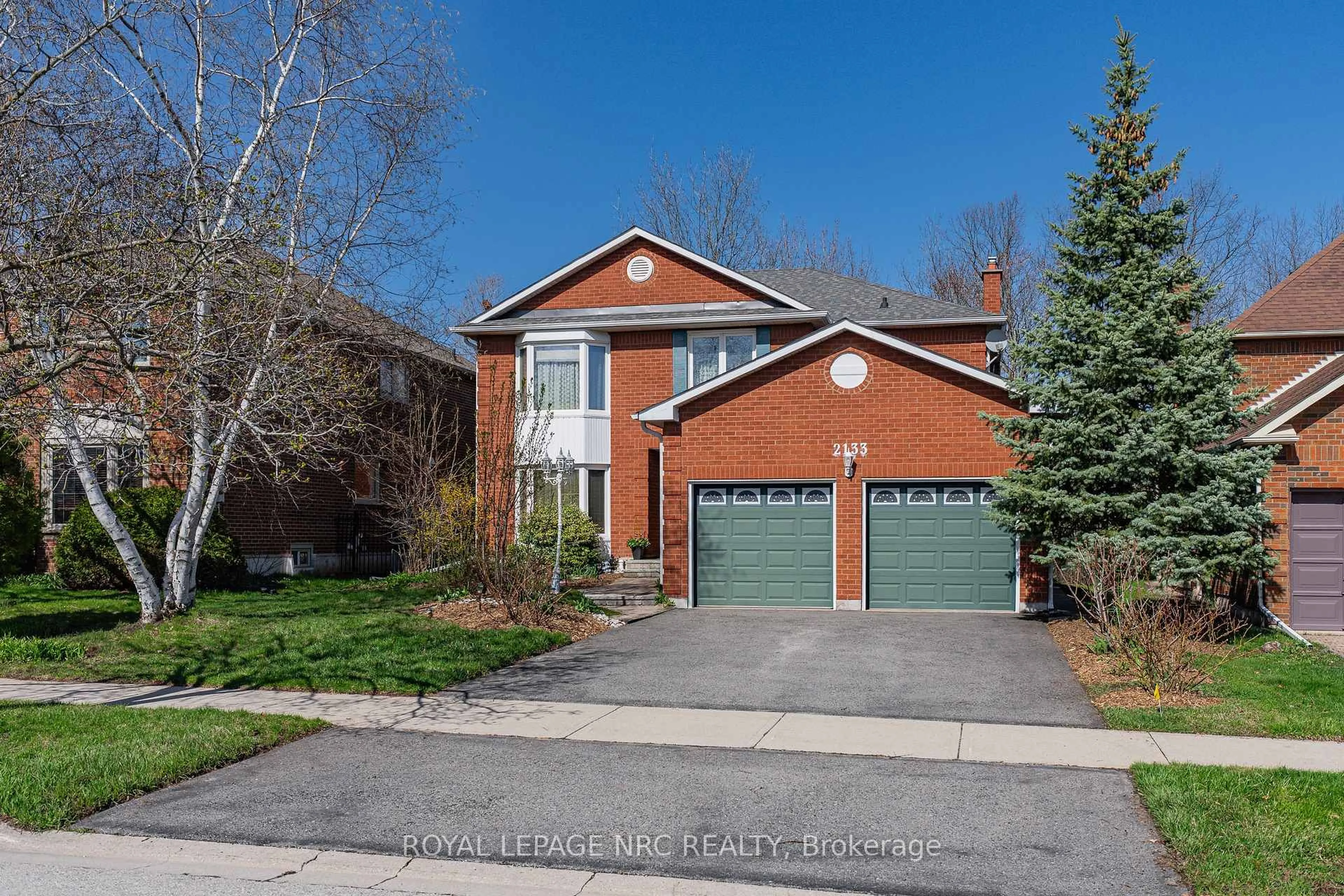 Home with brick exterior material, street for 2133 Grand Blvd, Oakville Ontario L6H 5M3