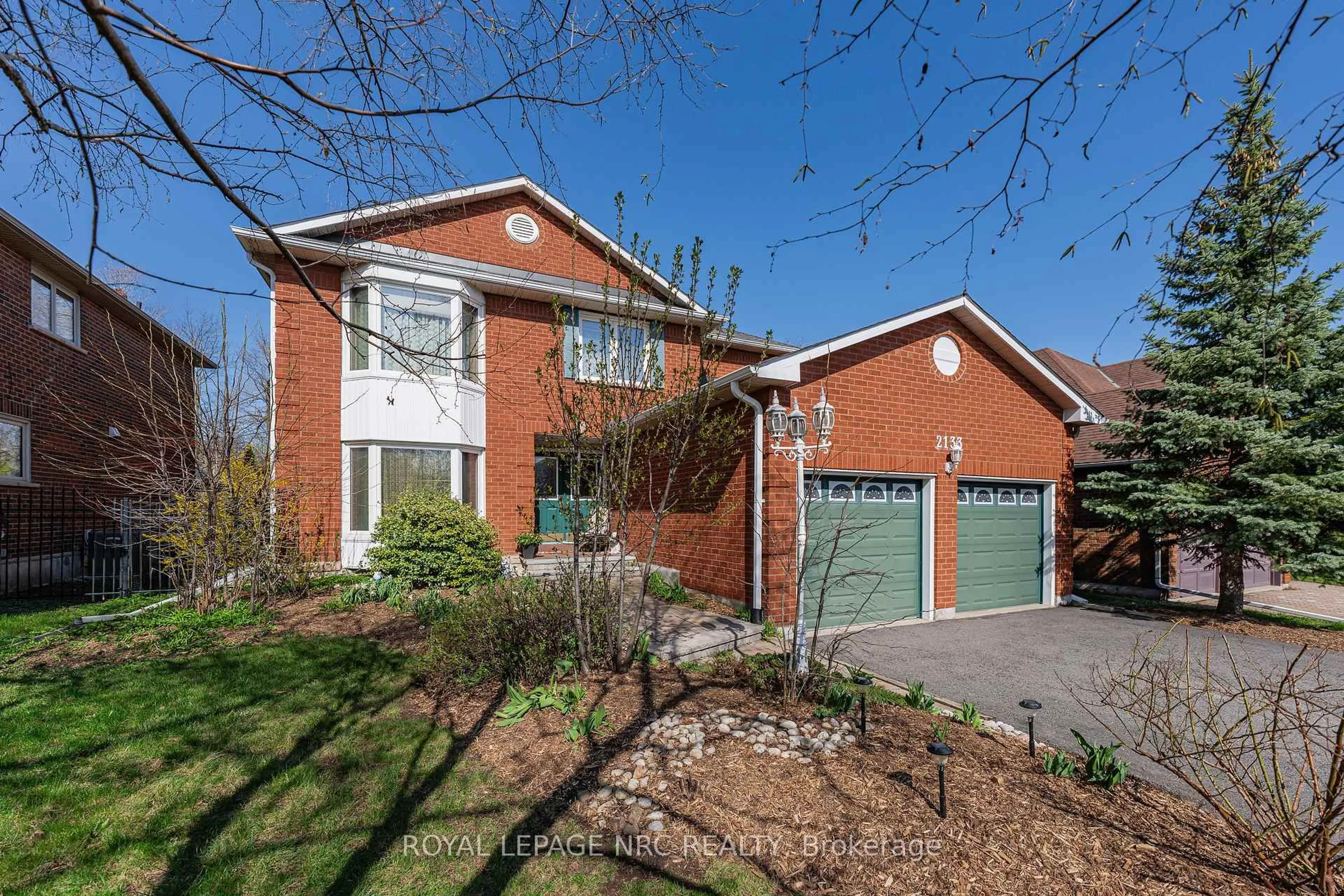 Home with brick exterior material, street for 2133 Grand Blvd, Oakville Ontario L6H 5M3