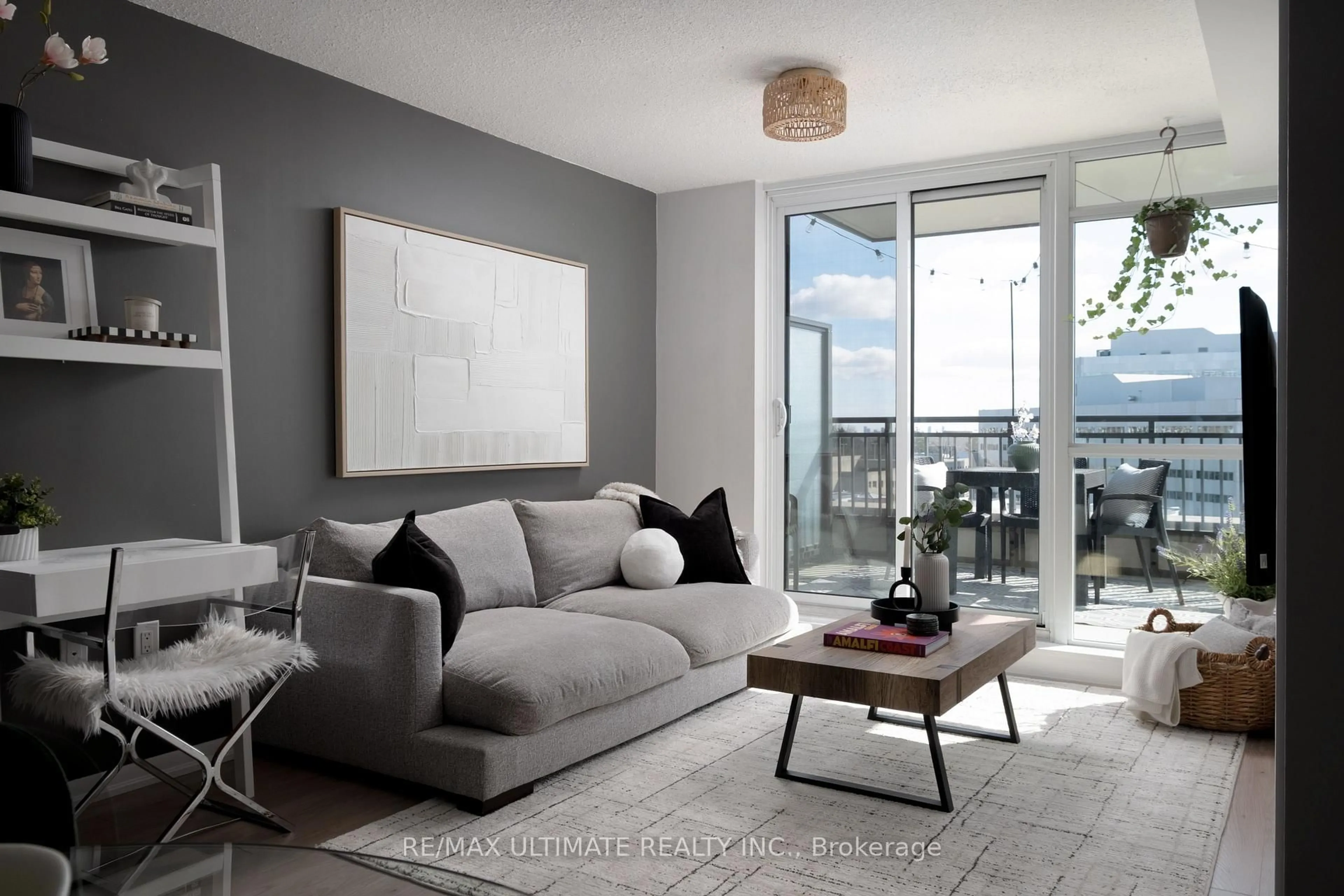 Living room with furniture, cement floor for 36 Via Bagnato #738, Toronto Ontario M6A 0B7