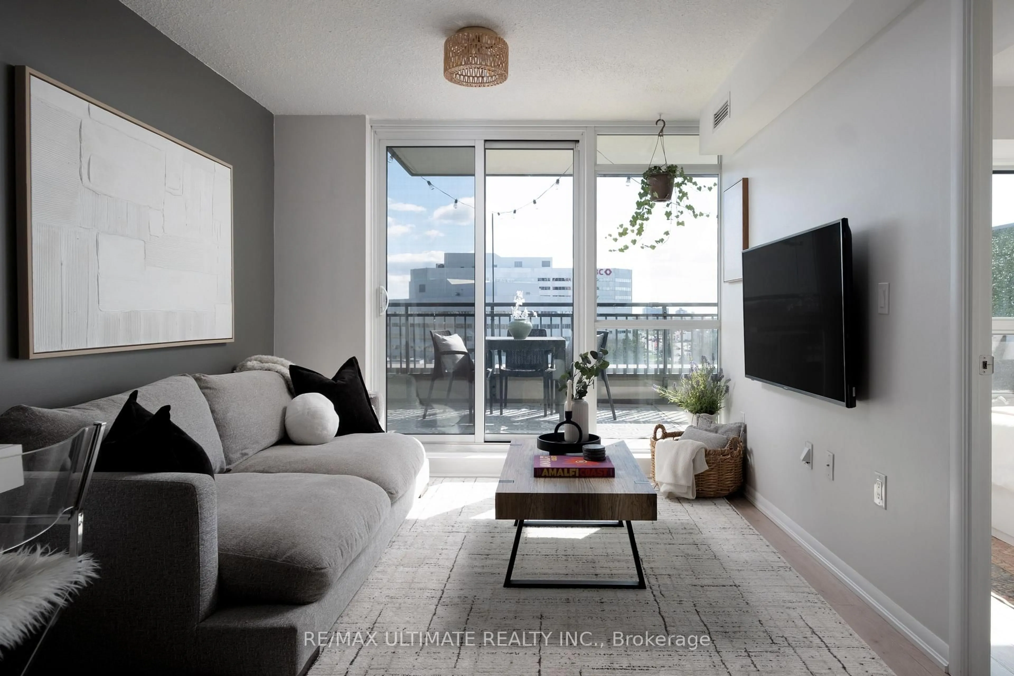 Living room with furniture, cement floor for 36 Via Bagnato #738, Toronto Ontario M6A 0B7