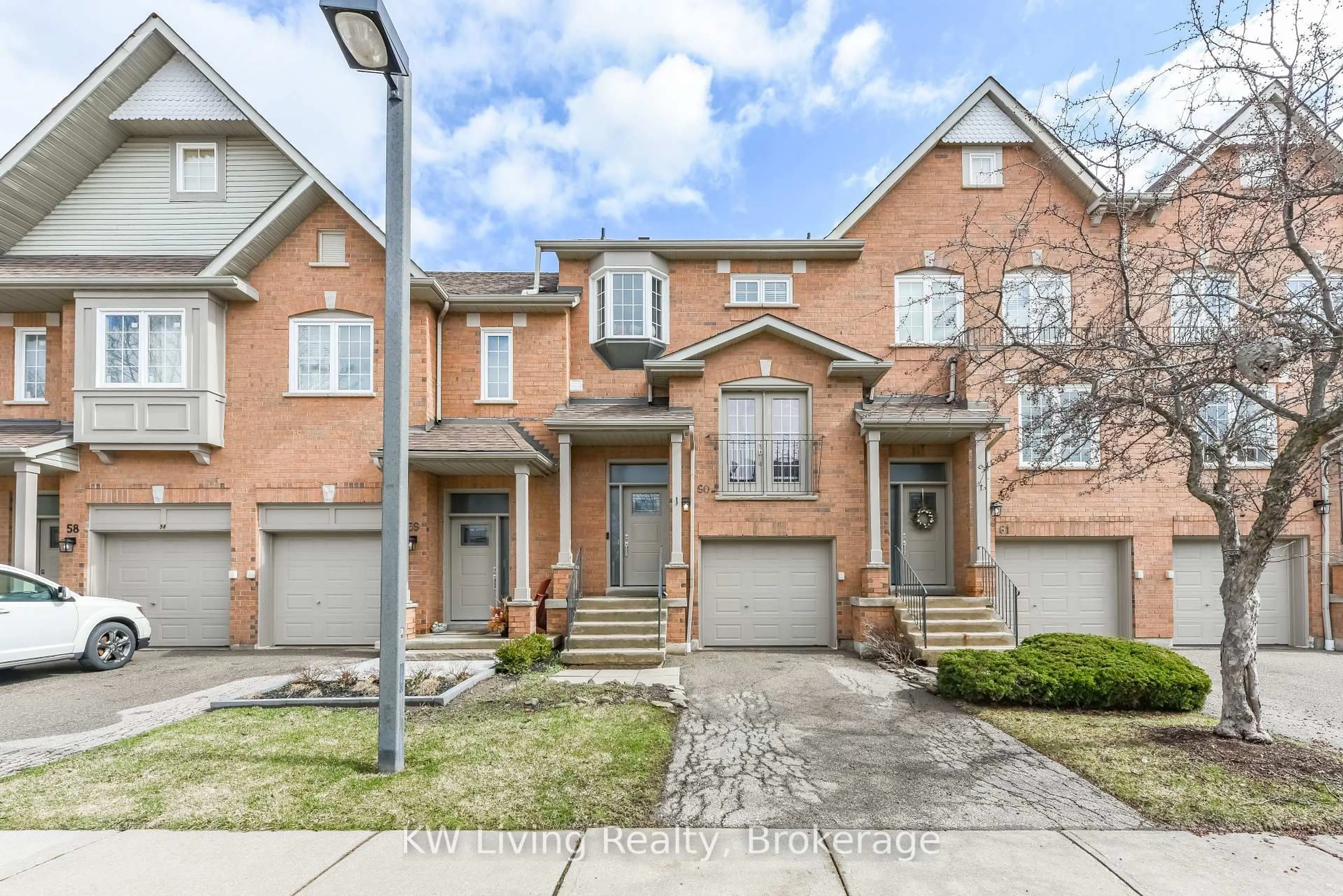 Home with brick exterior material, street for 1588 South Parade Crt #60, Mississauga Ontario L5M 6E7