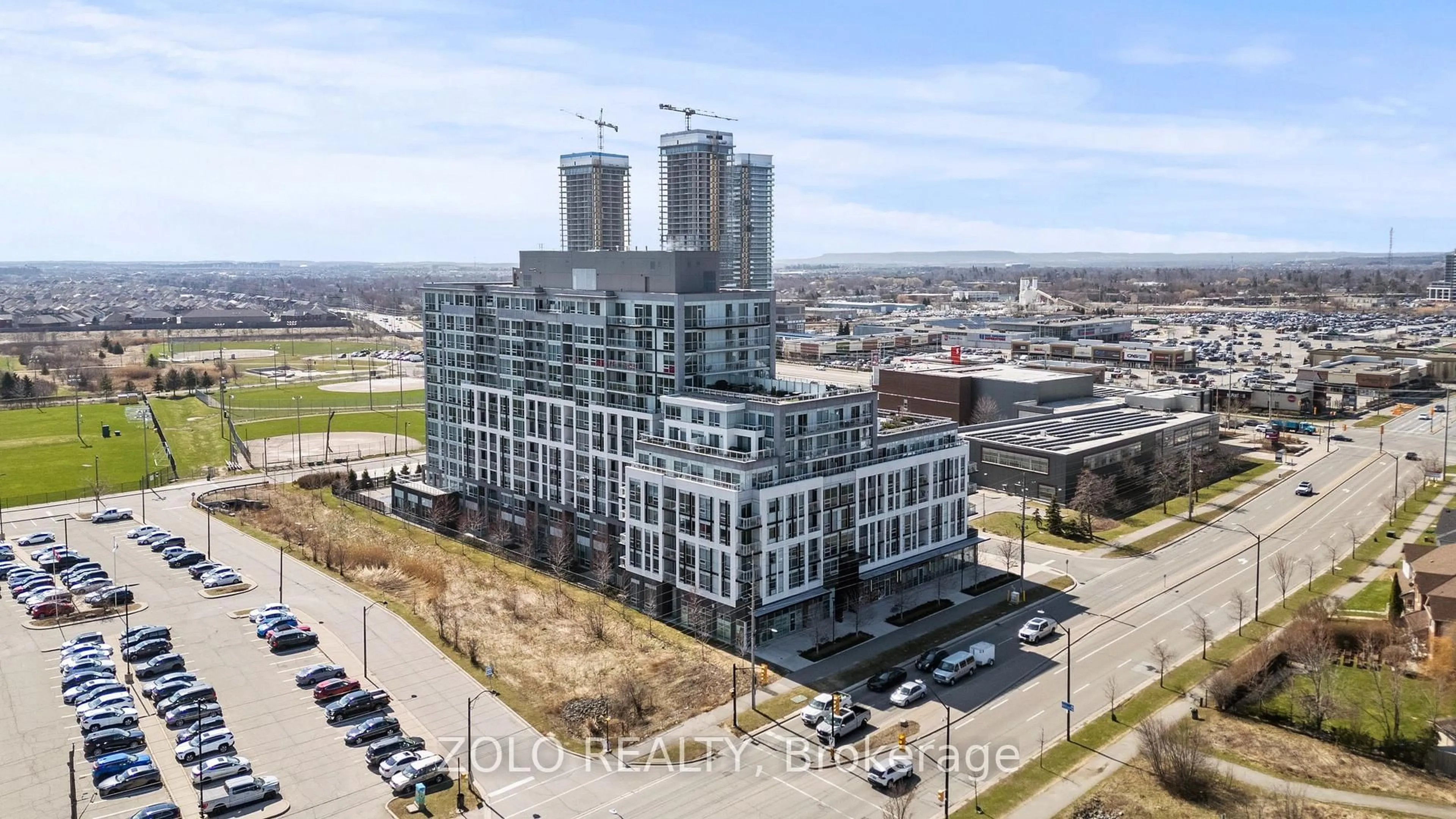 A pic from outside/outdoor area/front of a property/back of a property/a pic from drone, city buildings view from balcony for 1050 Main St #618, Milton Ontario L9T 9M3