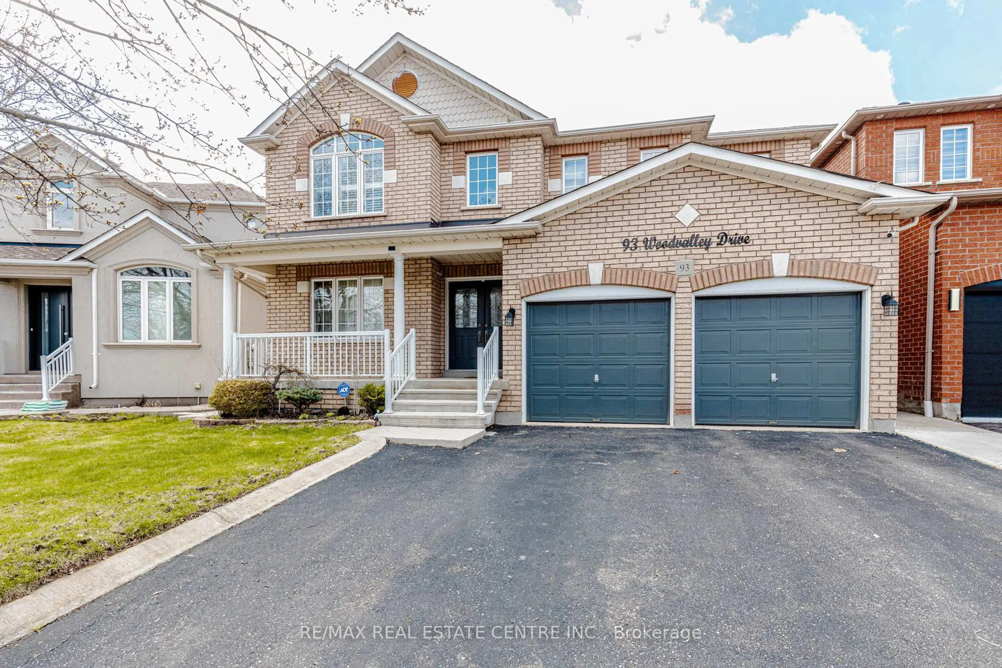 Home with brick exterior material, street for 93 Woodvalley Dr, Brampton Ontario L7A 2G1