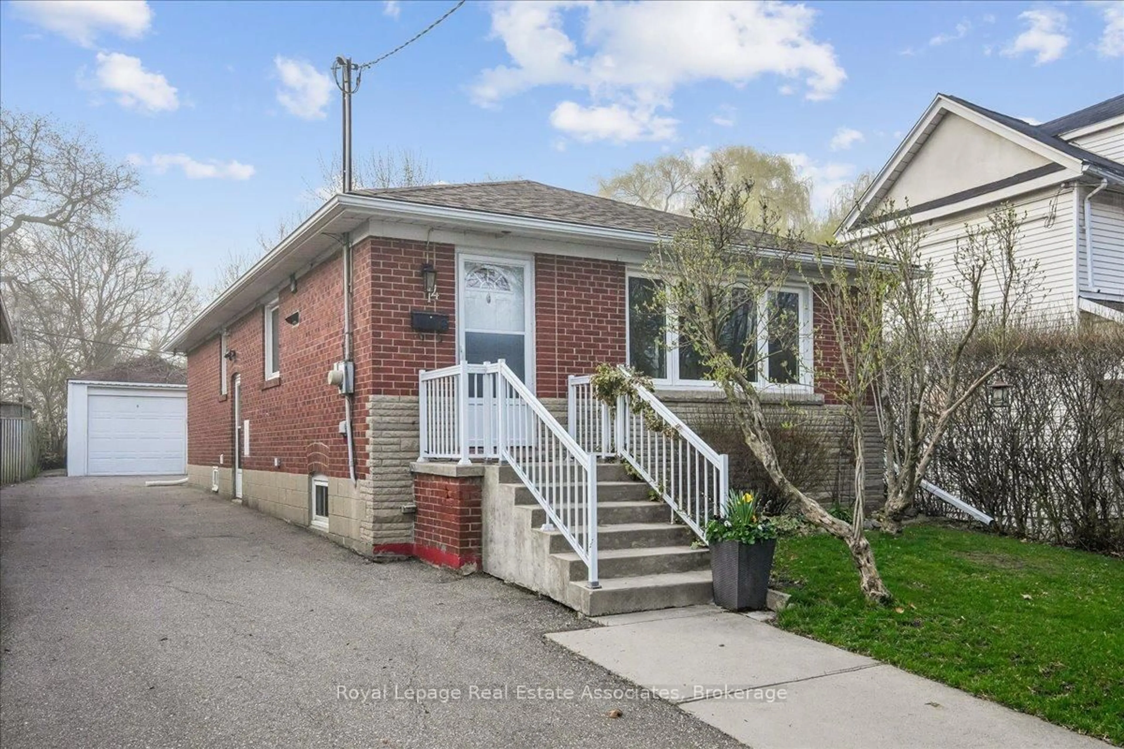 Home with brick exterior material, street for 14 Cavell Ave, Toronto Ontario M8V 1P2